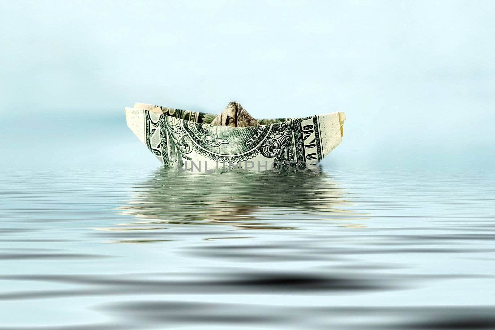 dollar ship in water - economy concept