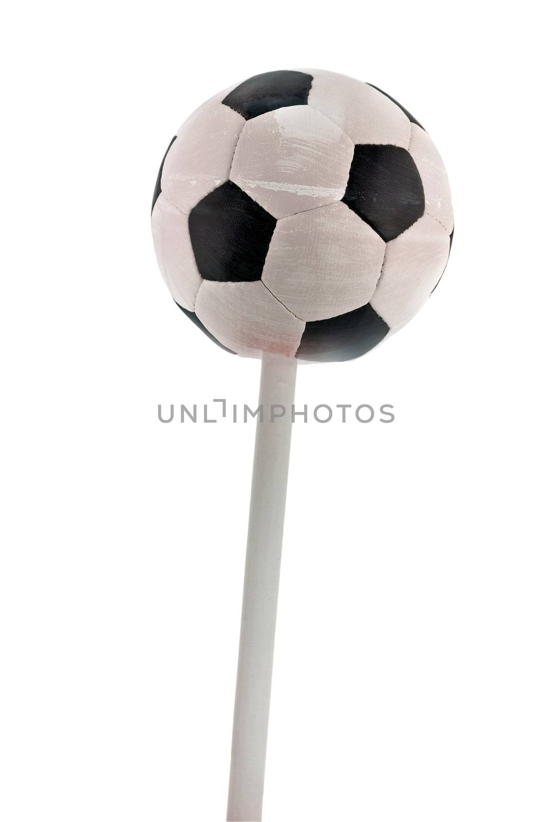 black and white soccer ball lollipop sweetmeat isolated