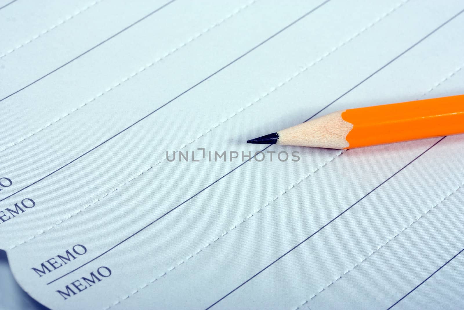memo pencil close up isolated on white background