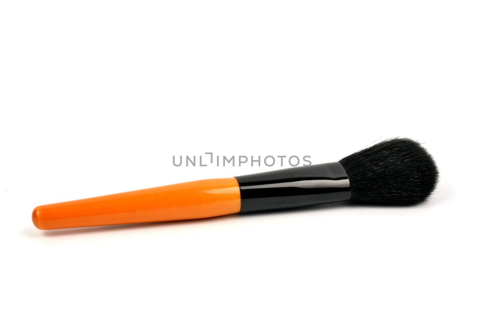 cosmetic brush on a white background 