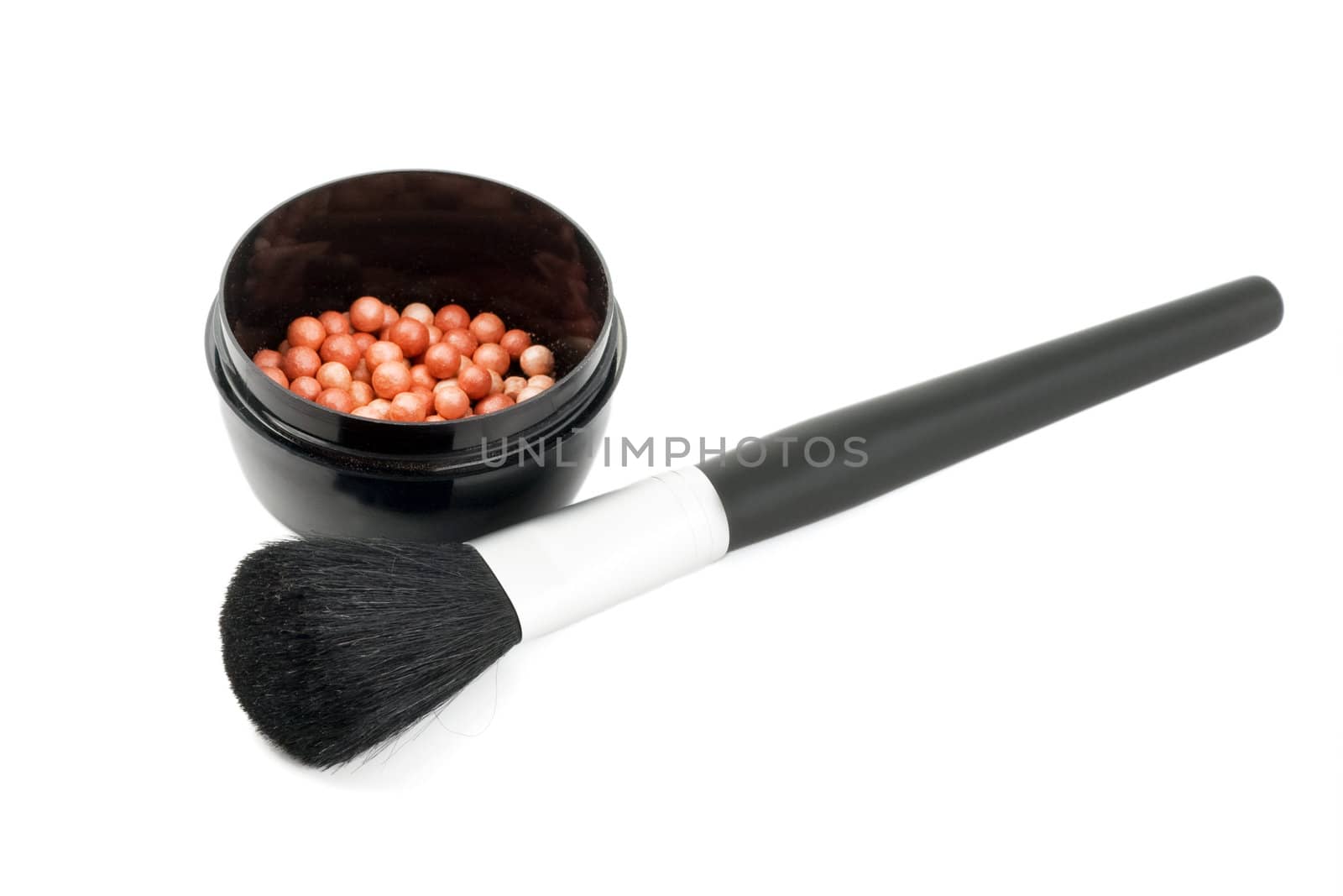 Blush cosmetics powder and makeup brush on white background