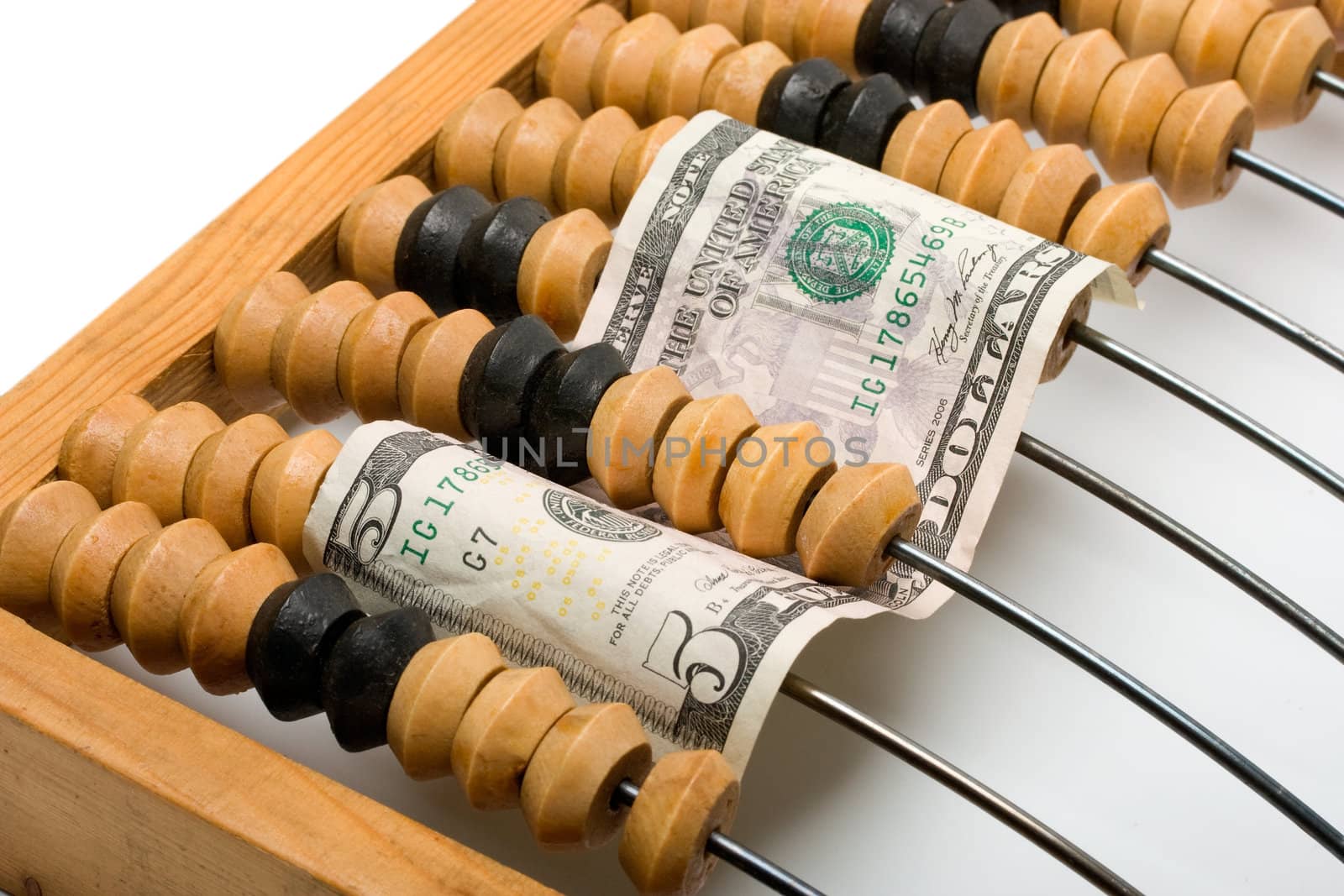 dollars in wooden abacus isolated on white background