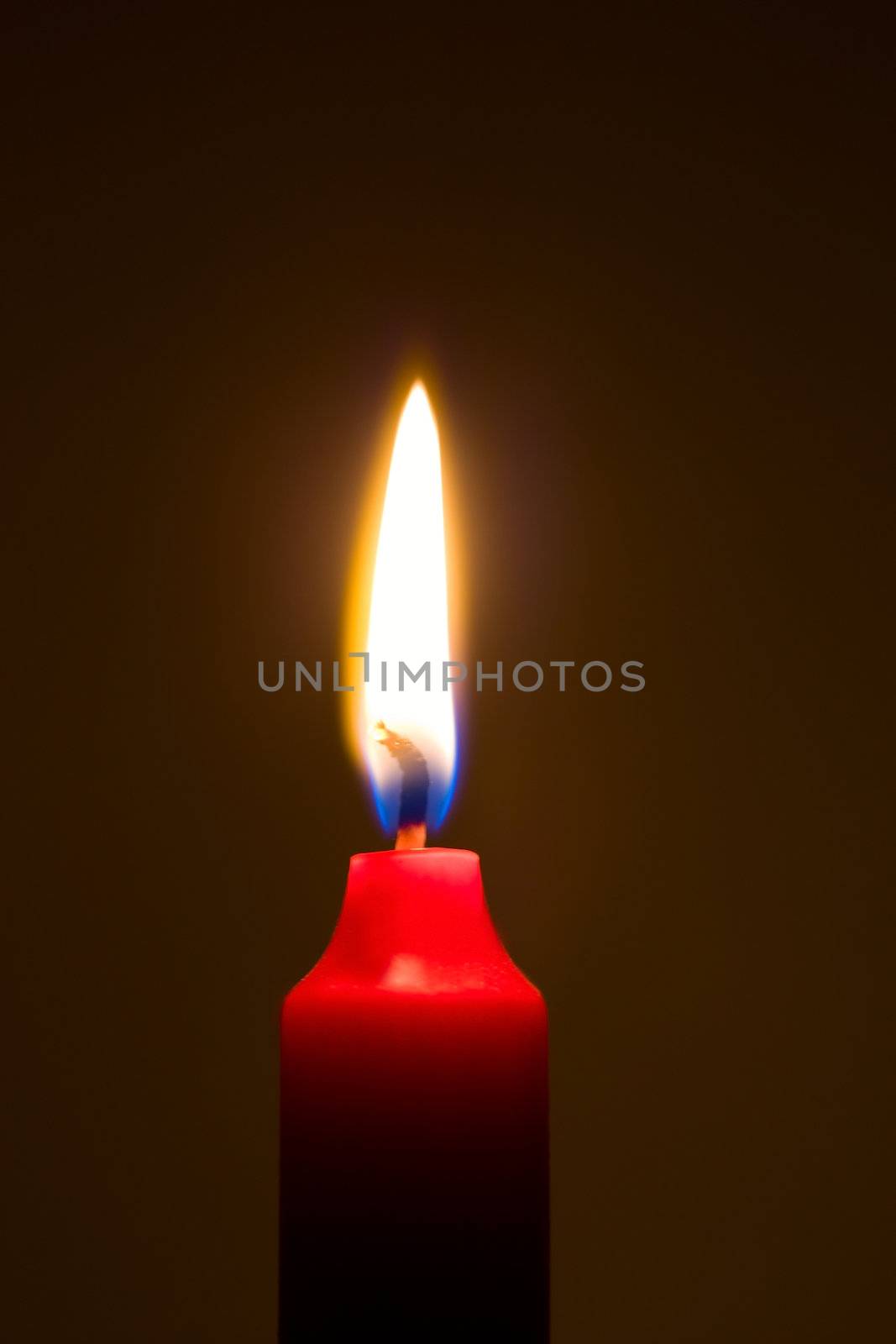 light a candle in the dark background
