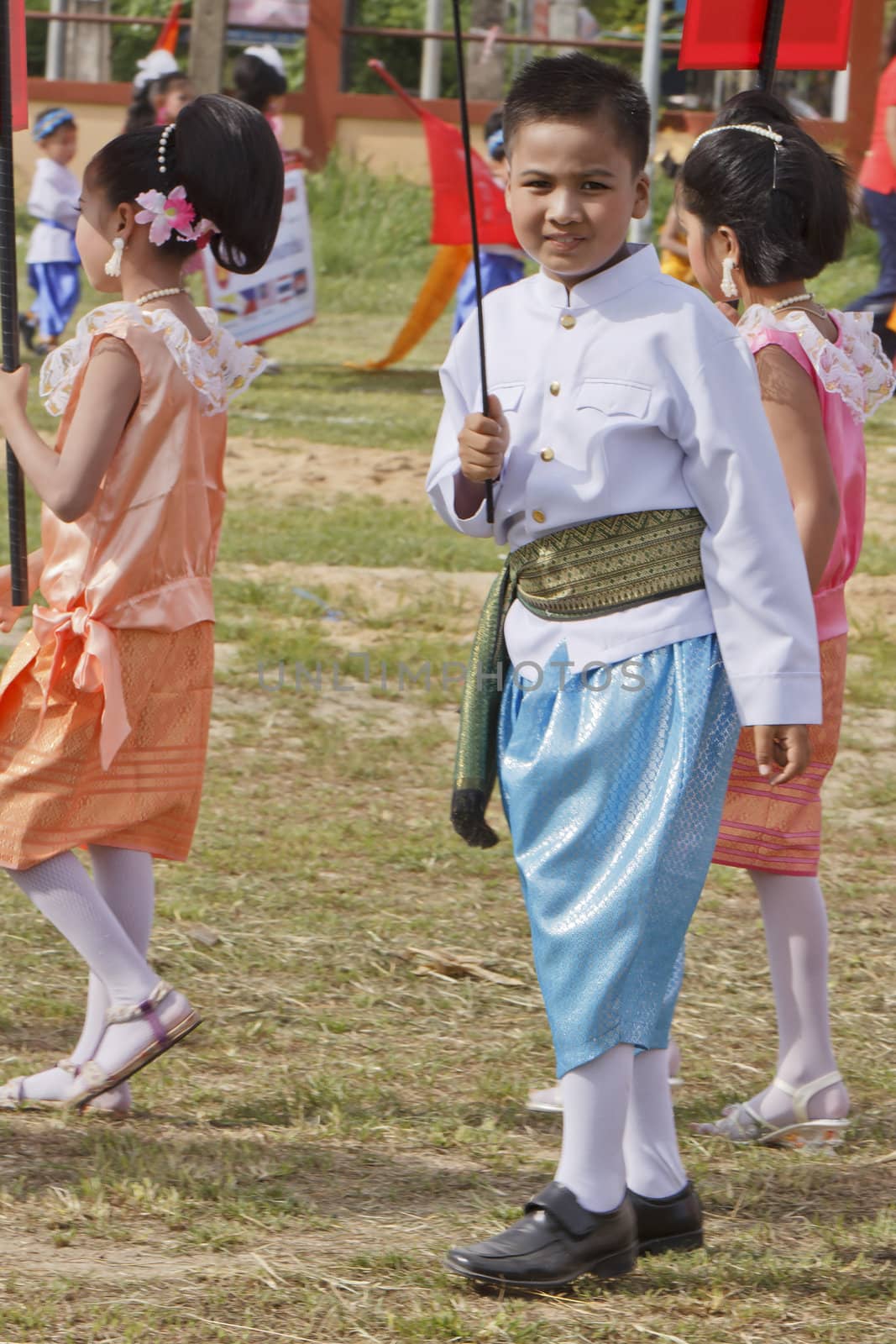 THAILAND - JULY 13: Thai students in Dokbual game school parade on July 13, 2012 in Suratthanee, Thailand.