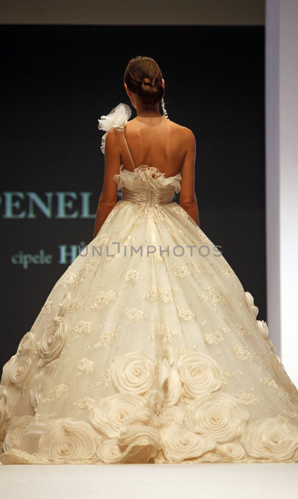 ZAGREB, CROATIA - FEBRUARY 19: Fashion model walks the runway in wedding dress on 'Wedding days' show, February 19, 2012 in Zagreb, Croatia.
