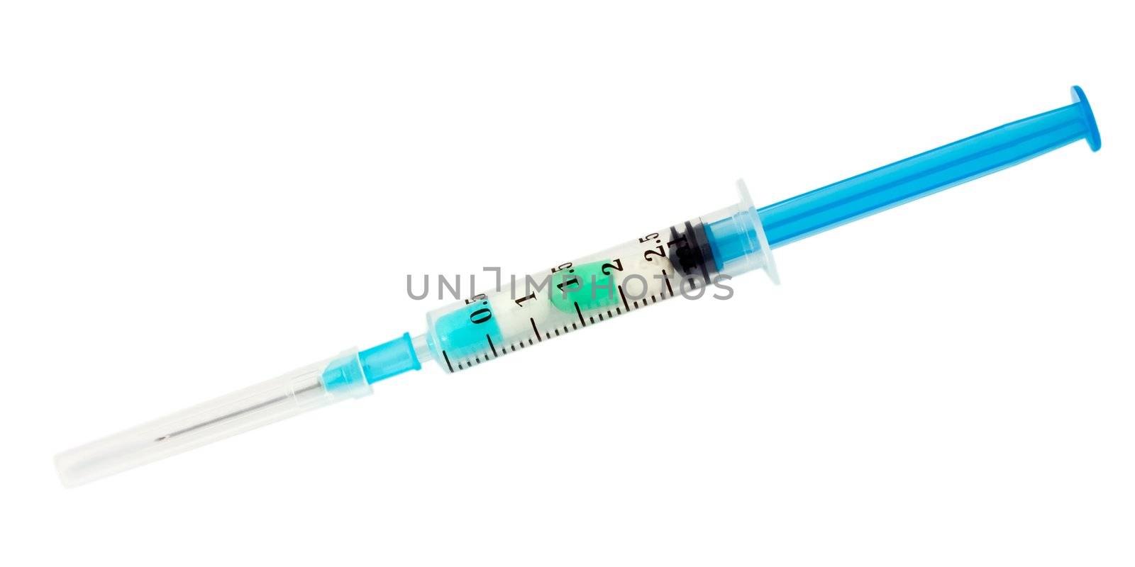 Syringe with capsules isolated on white background