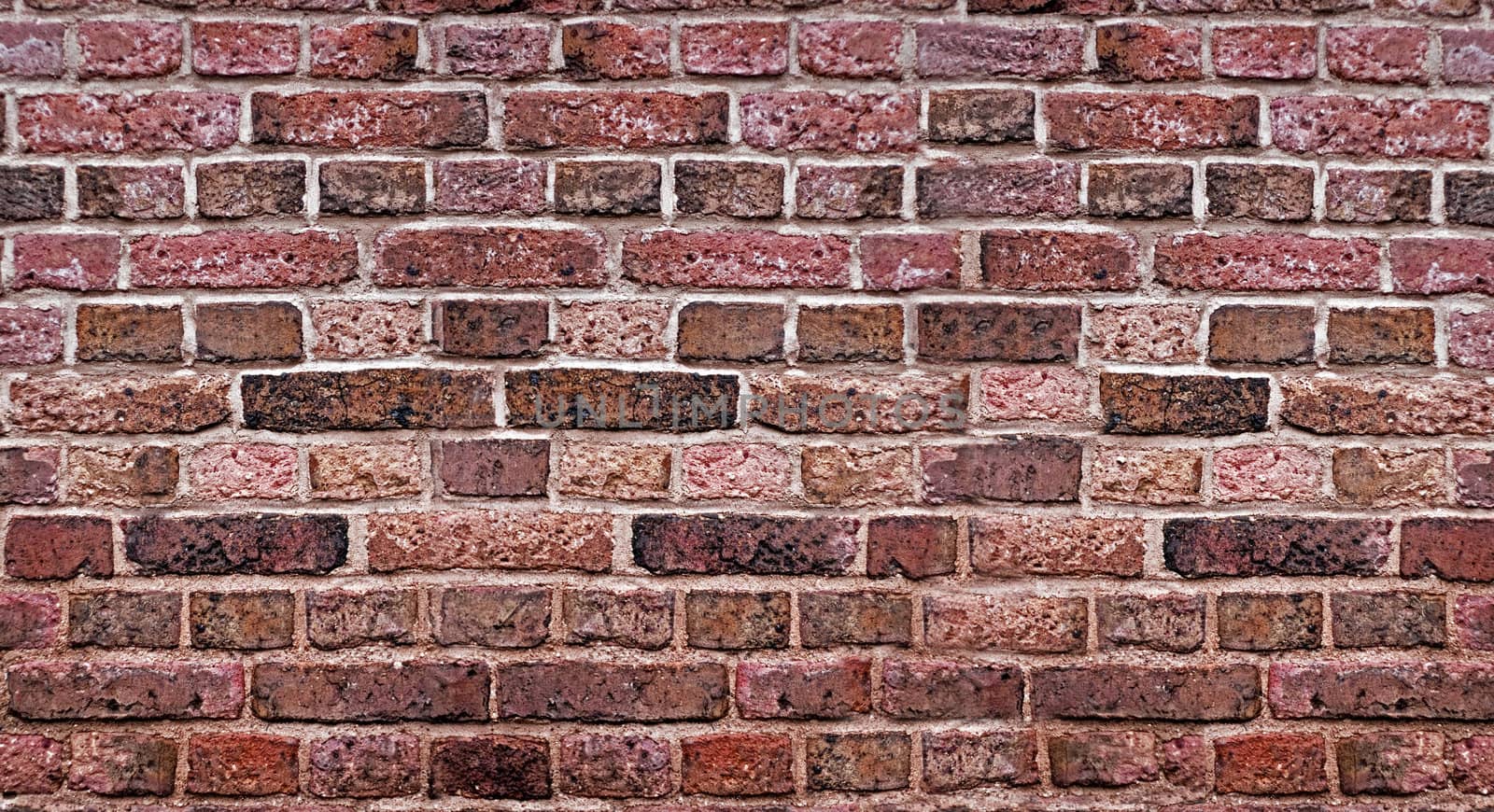 old weathered stained red brick wall background