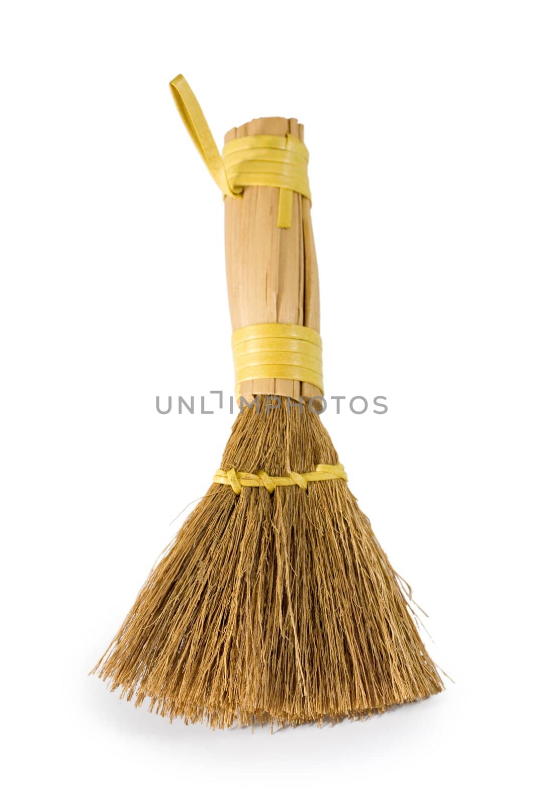 besom cleaner brush close up isolated on white background