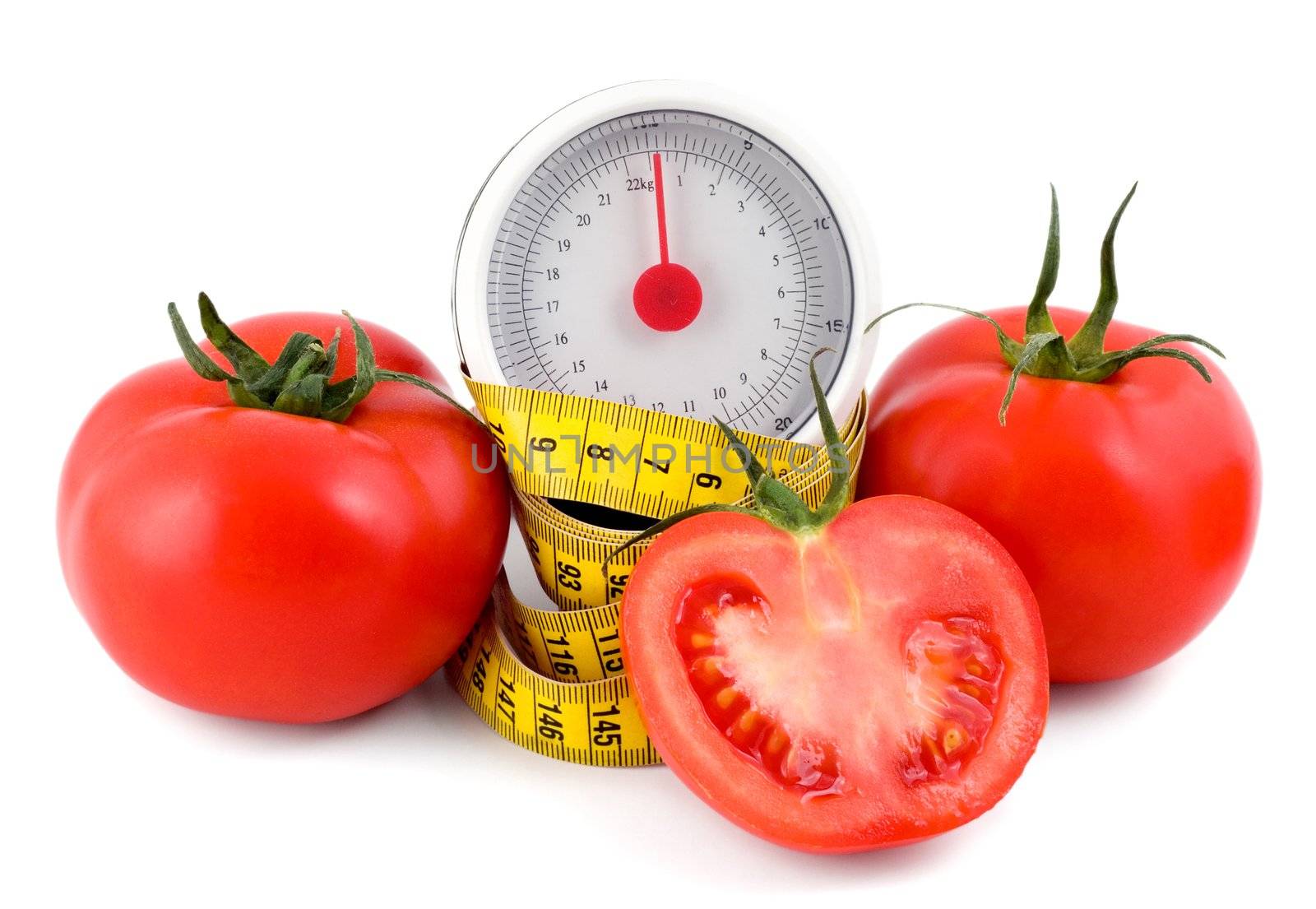 tomato and measuring tape isolated on white background