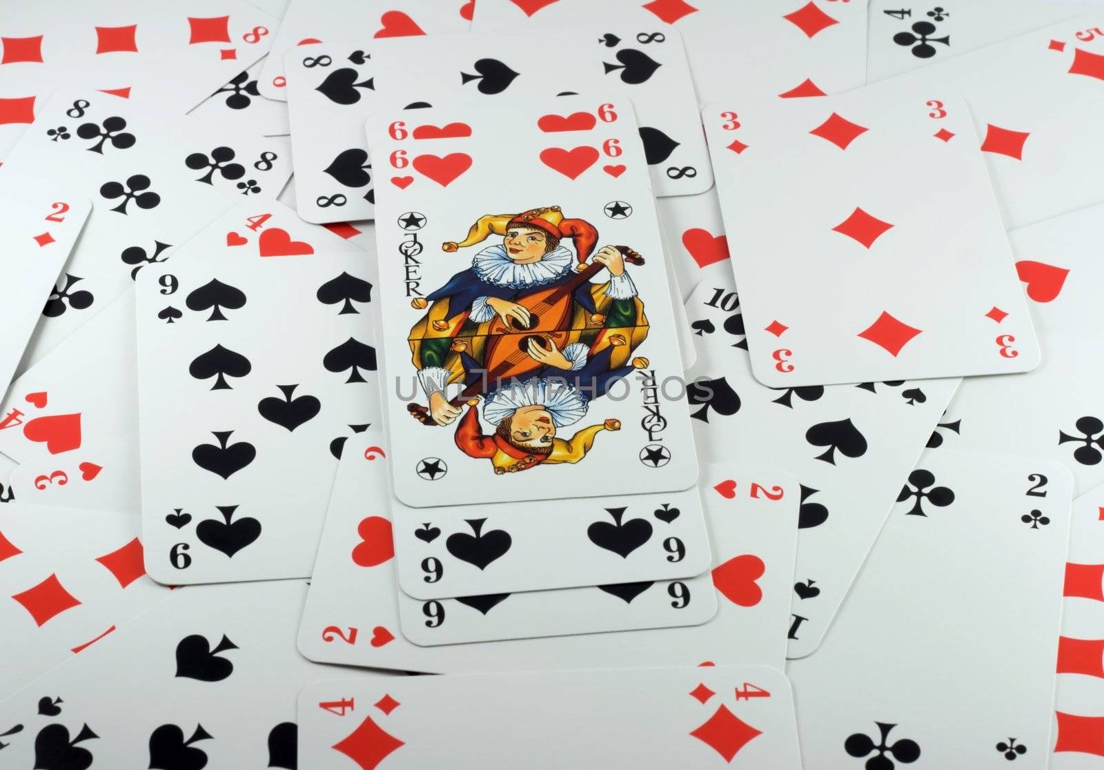 Poker cards background, with six beside Joker.