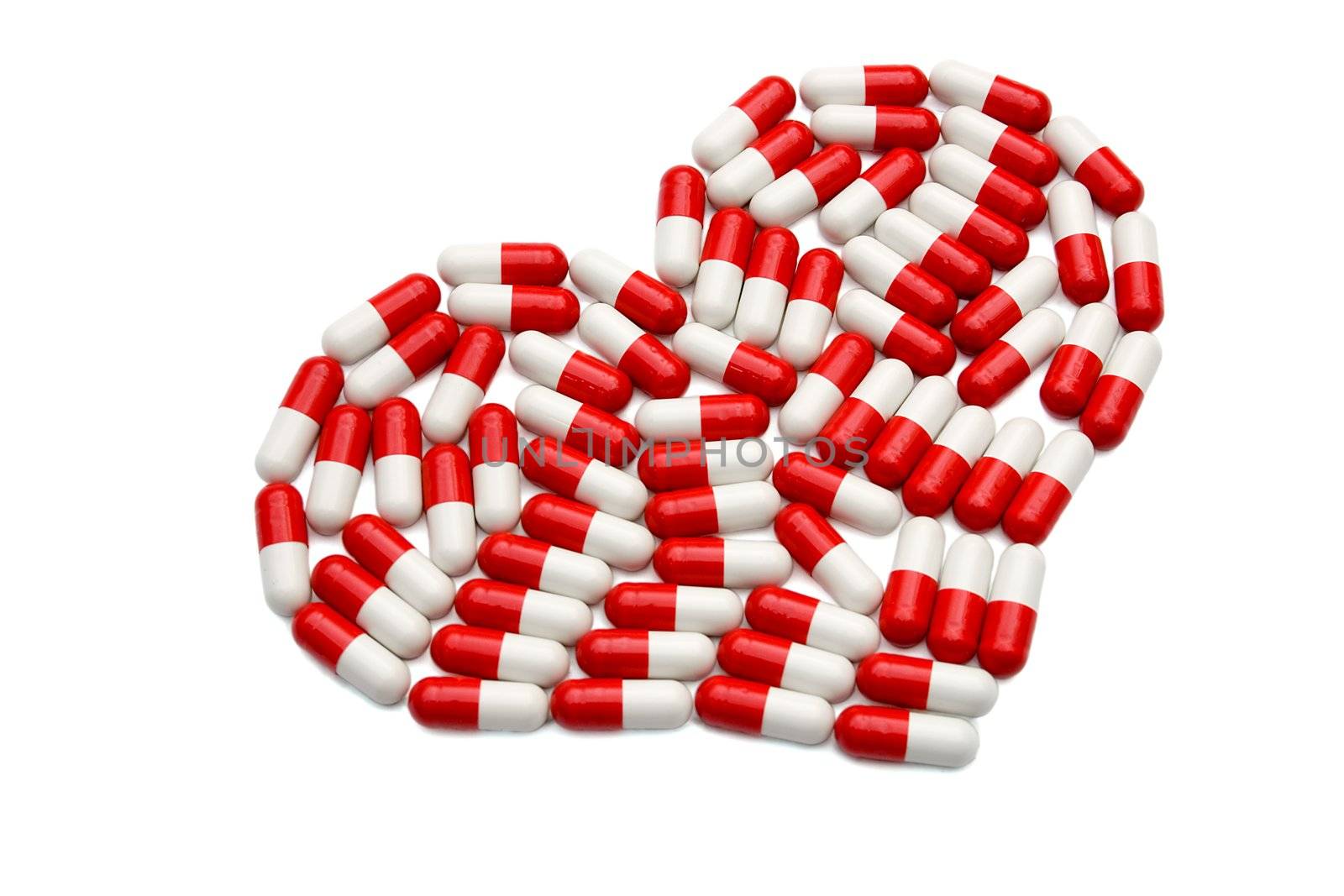 red pill shape heart love concept isolated on white background
