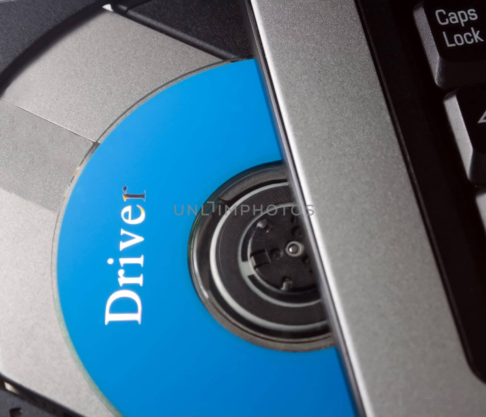 Laptop with open CD holder , driver disc