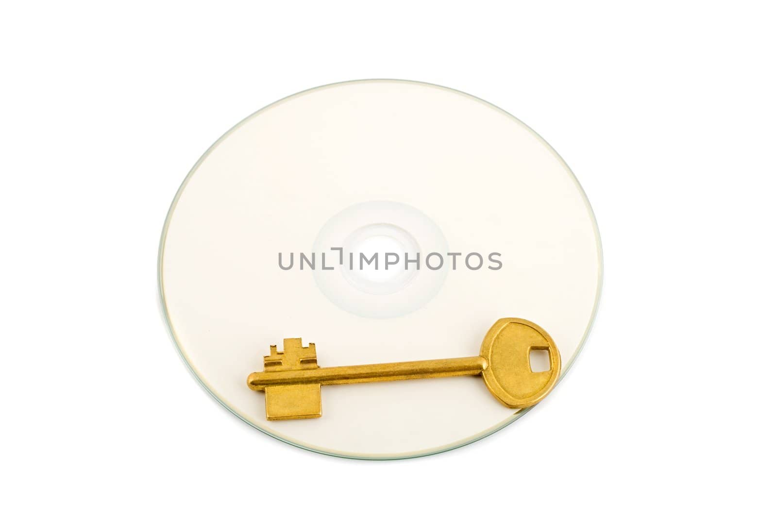 golden key on compact disk isolated on white background