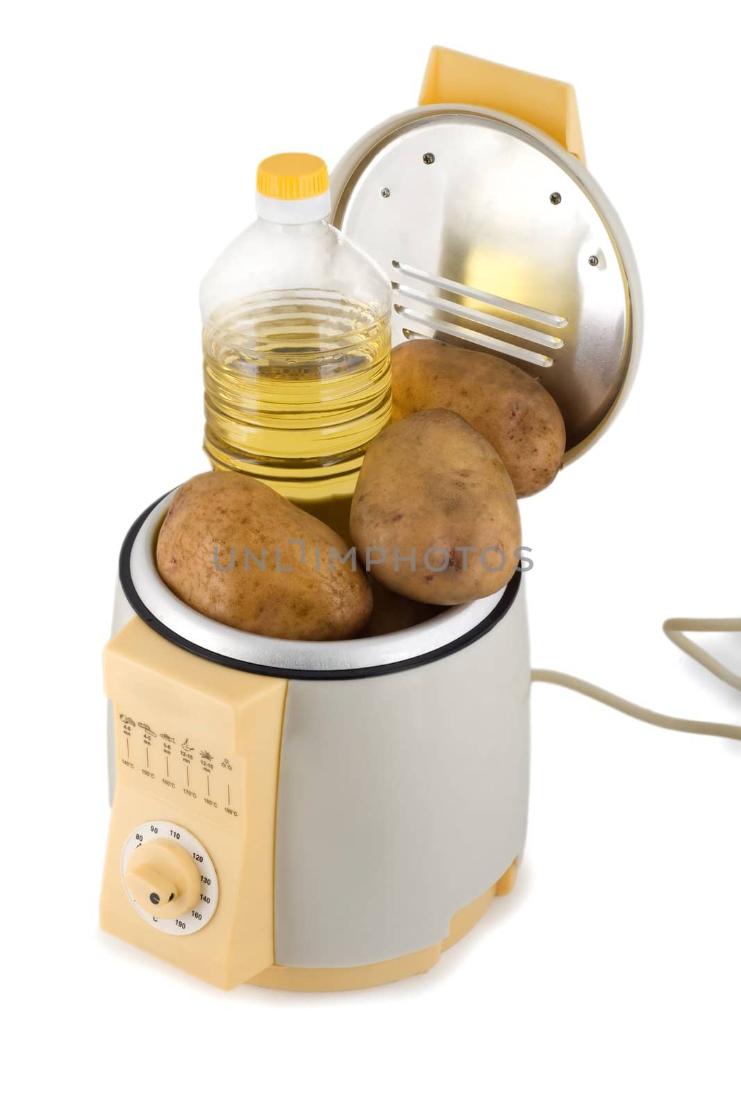 fry potatoes prepared in french fries machine isolated on white background