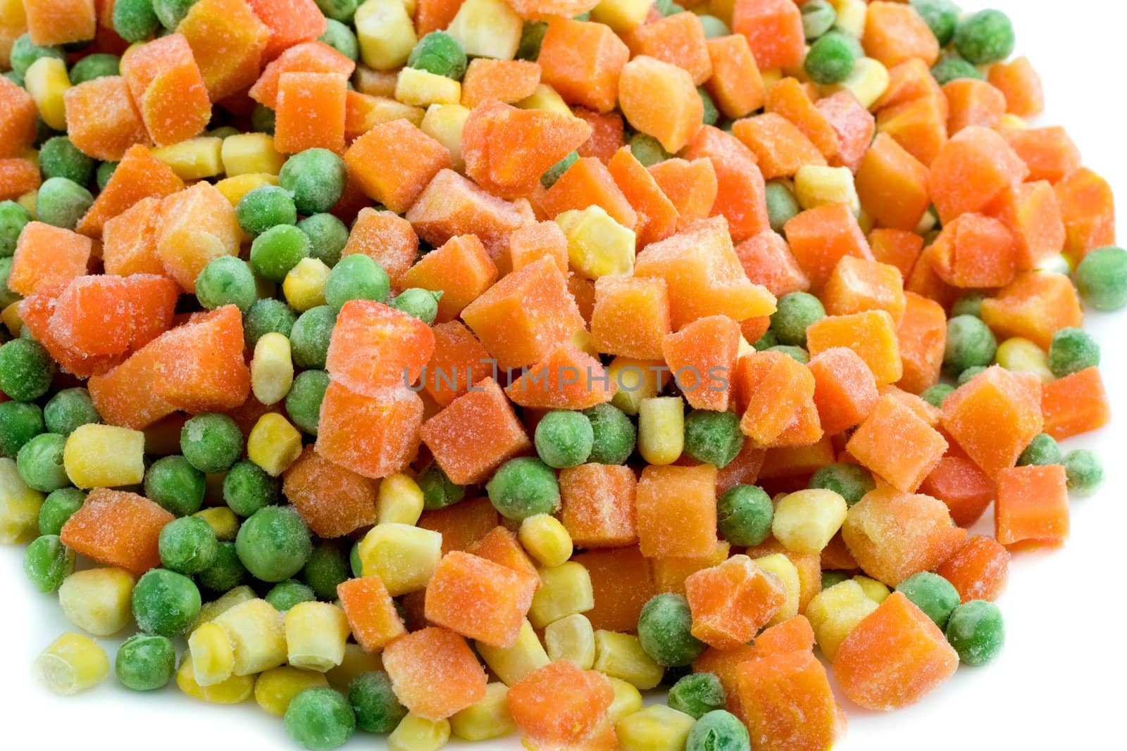 Frozen vegetables close-up isolated on white background