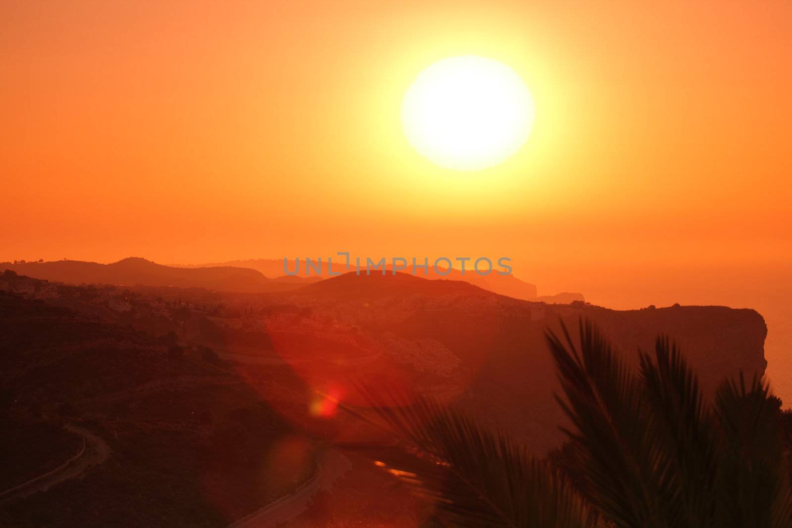 Summer landscape in mountains with the sun