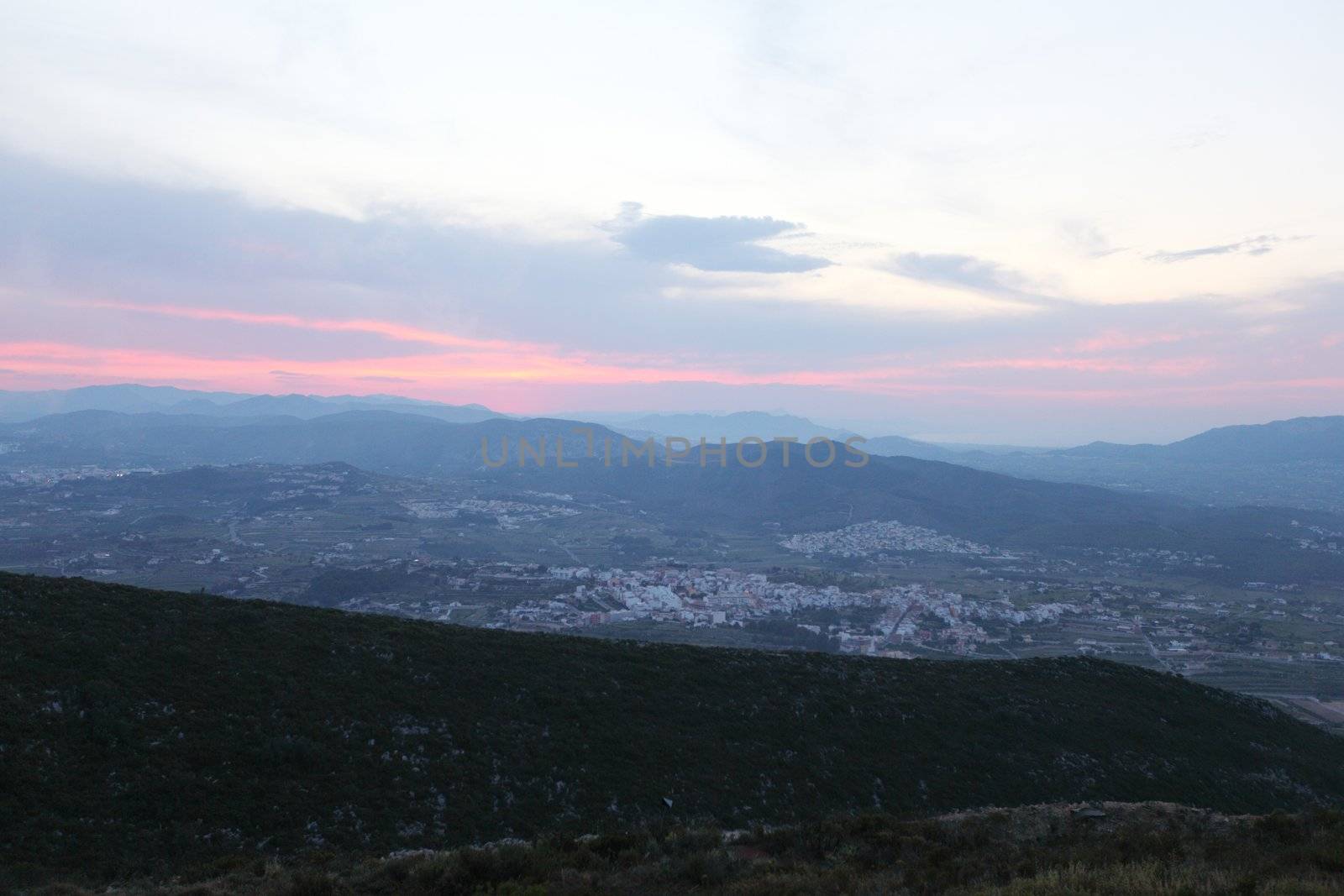 Summer landscape in mountains with the sun