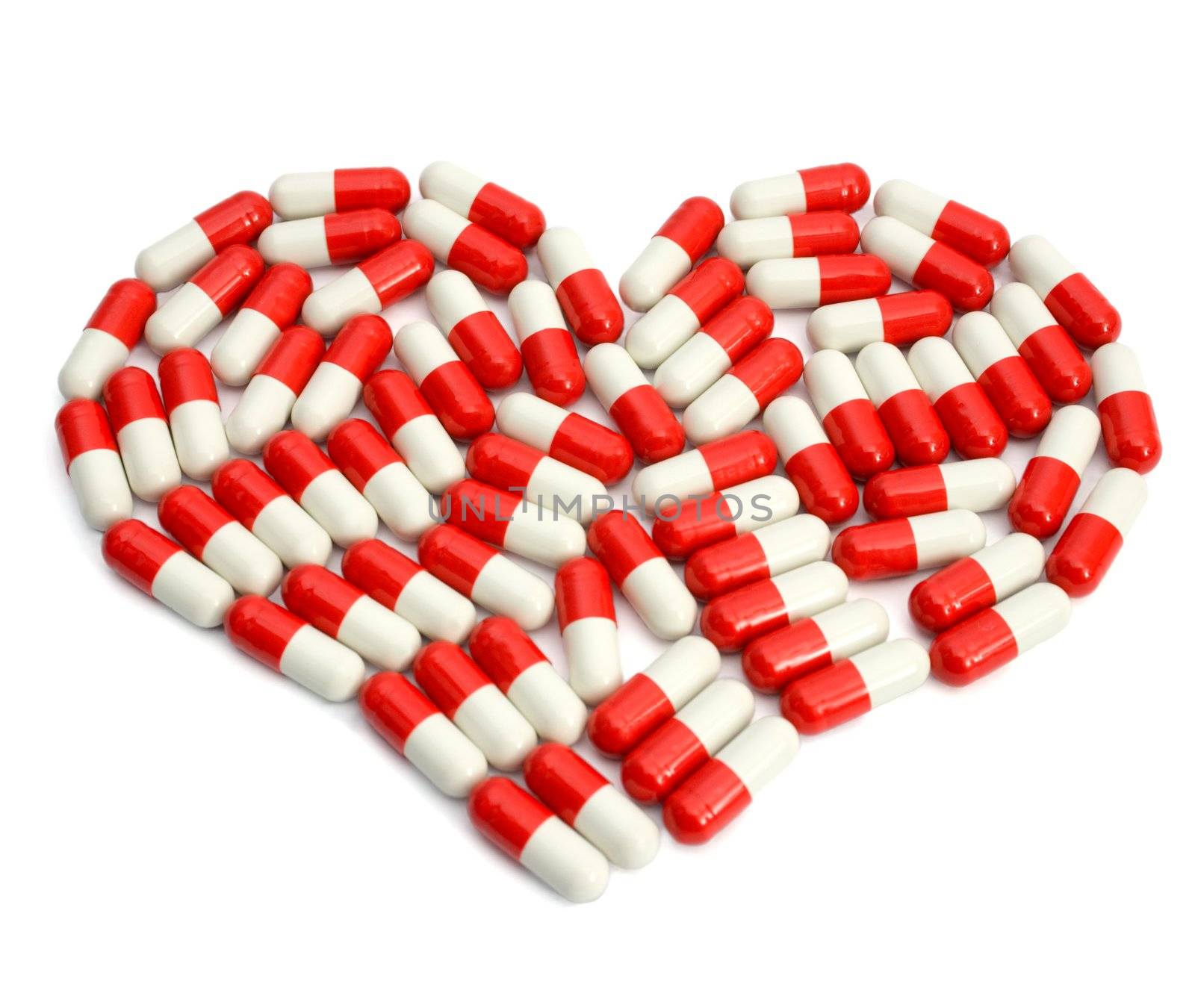 Capsule formed heart, isolated on white background