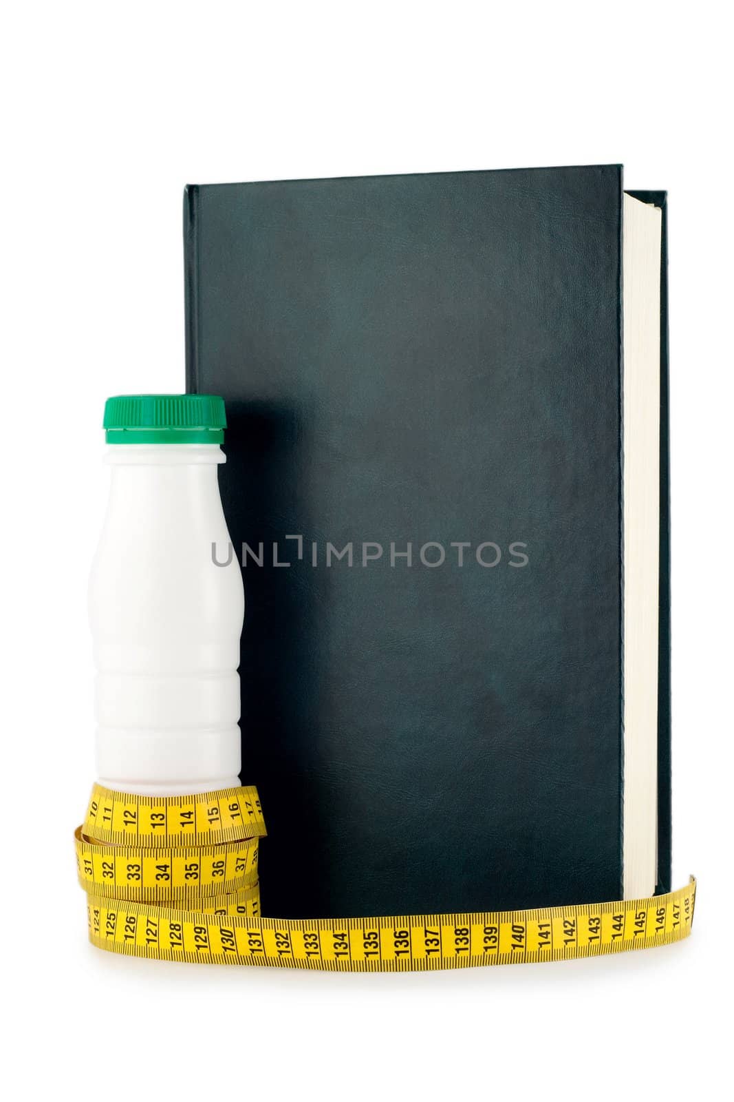 book ,bottle and measuring tape for a healthy lifestyle