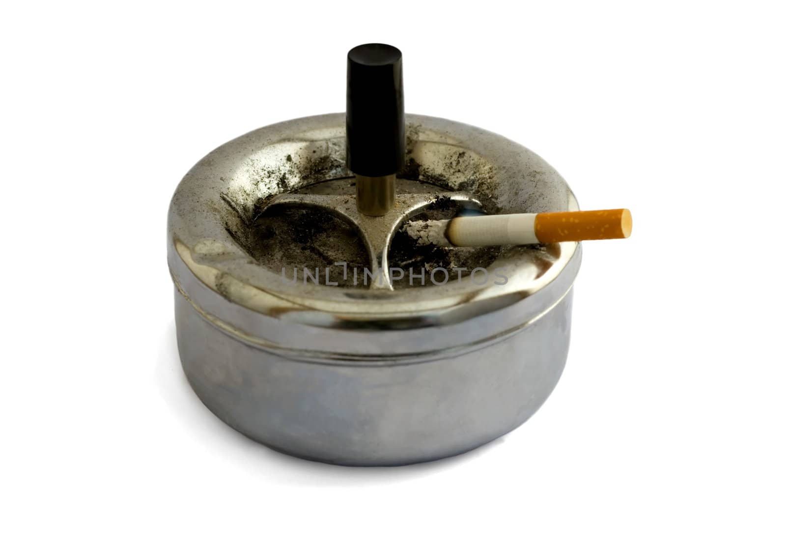 Ashtray and cigarette close-up,isolated on a white background.