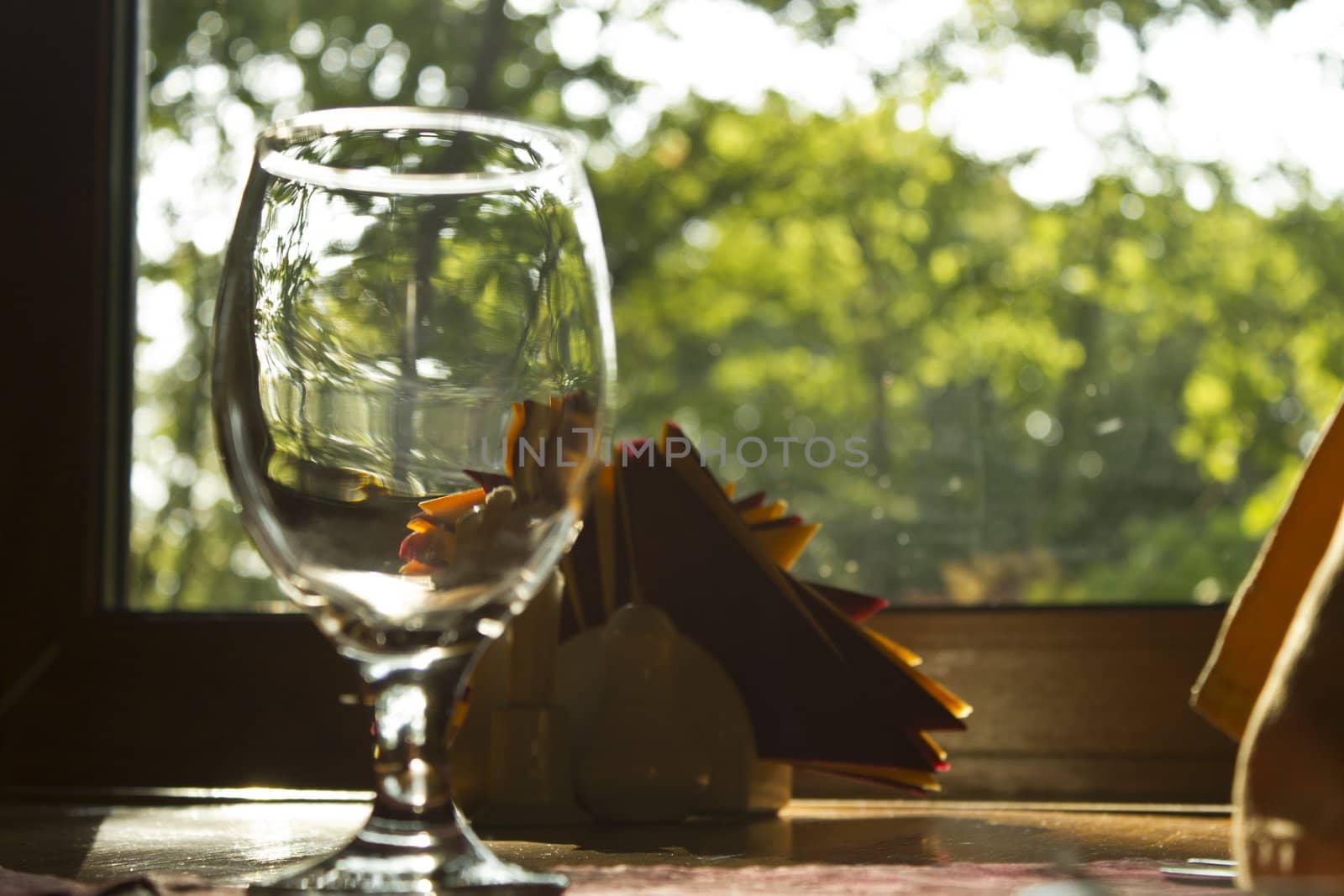 Glasses on a table in evening cafe waiting