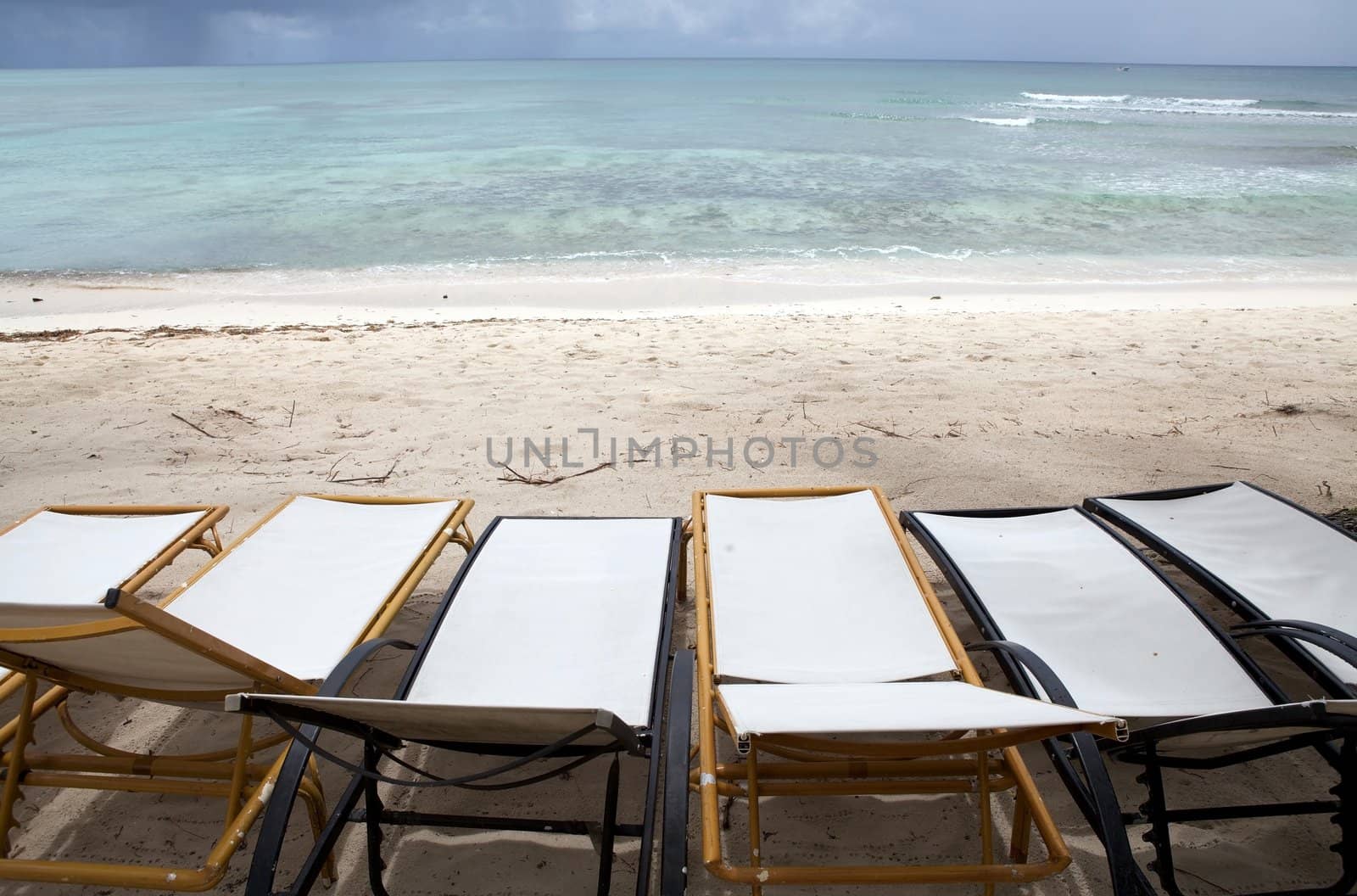 Ocean landscape from the deck chairs on the beach 