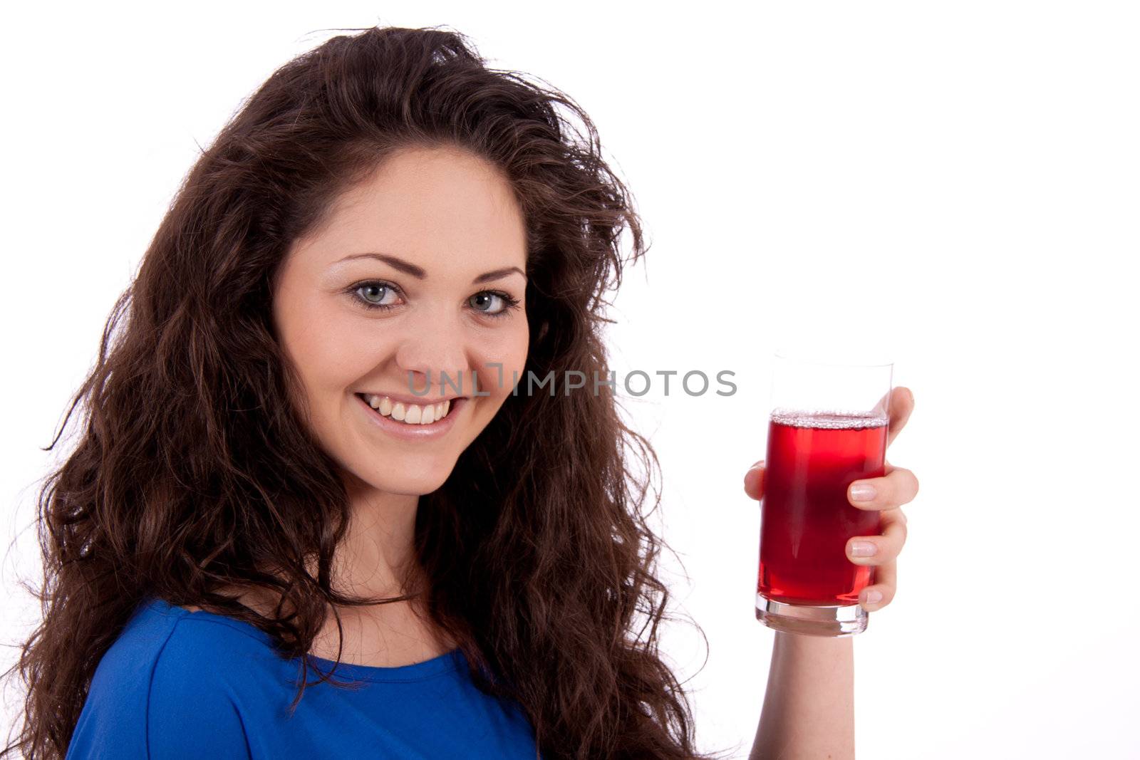 beautiful smiling brunette woman is drinking red juice by juniart