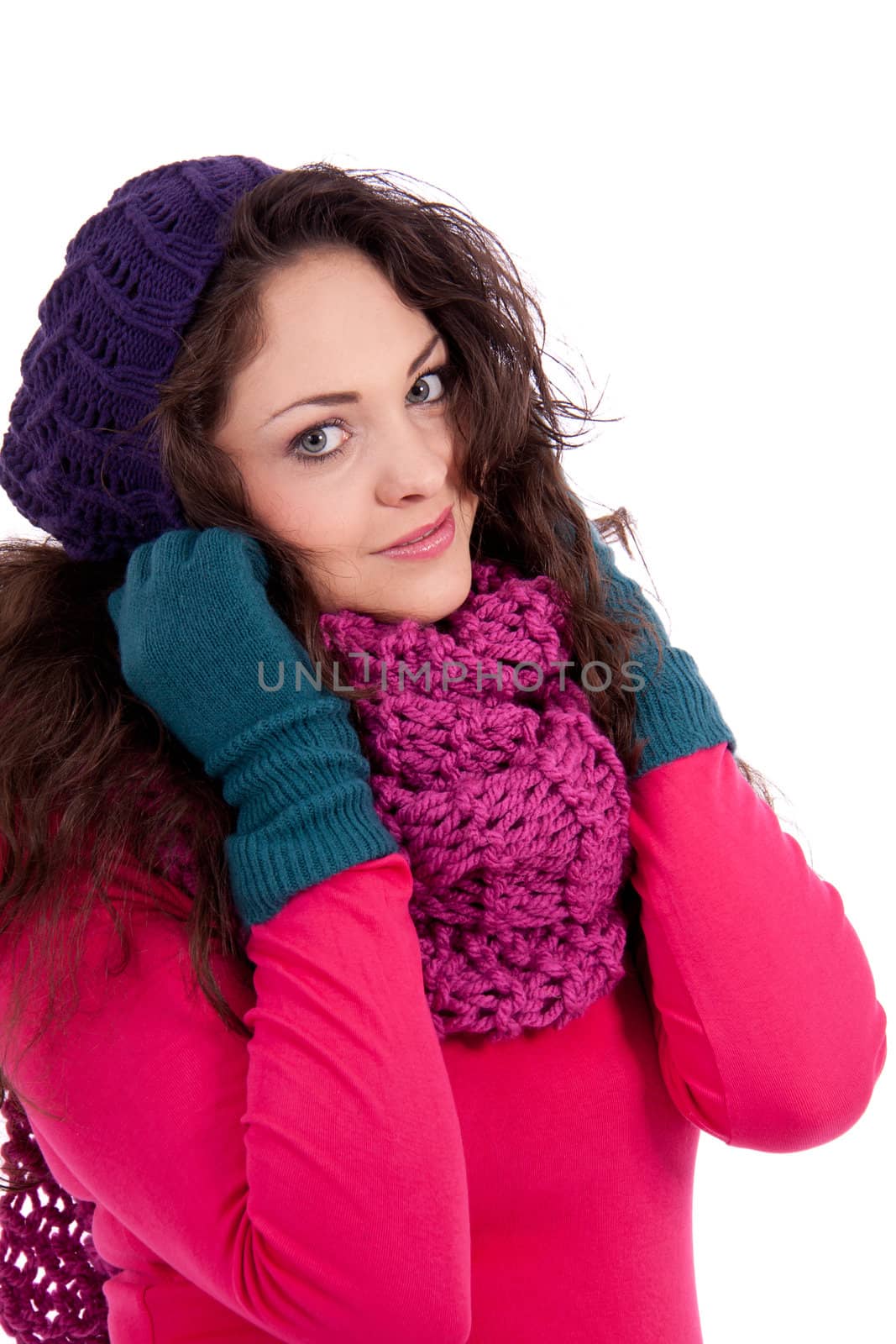 beautiful young smiling girl with hat and scarf in winter isolated on white background