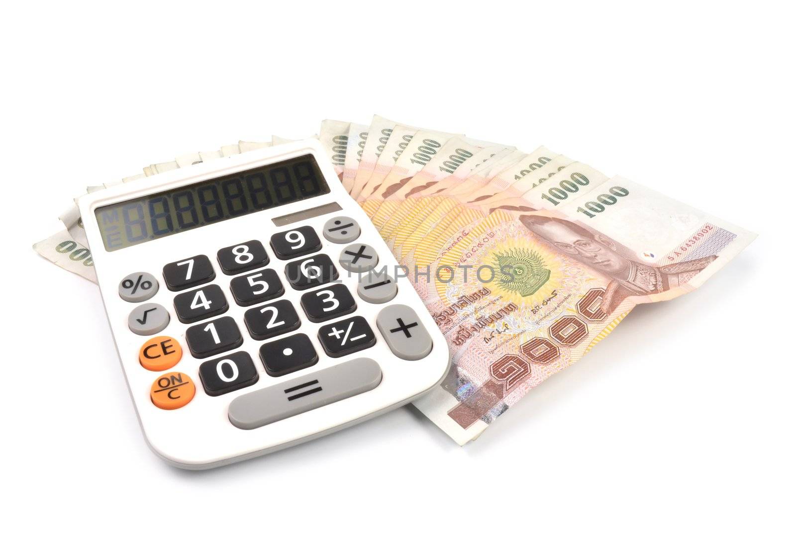 1000 baht banknotes and calculator isolated on white background