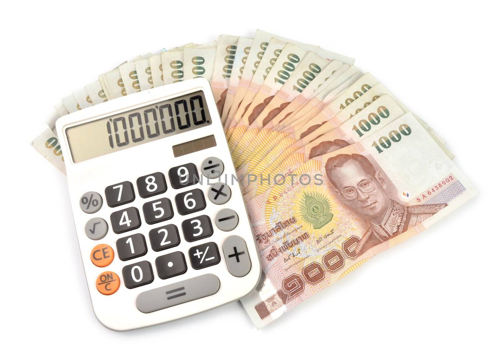 1000 baht banknotes and calculator isolated on white background