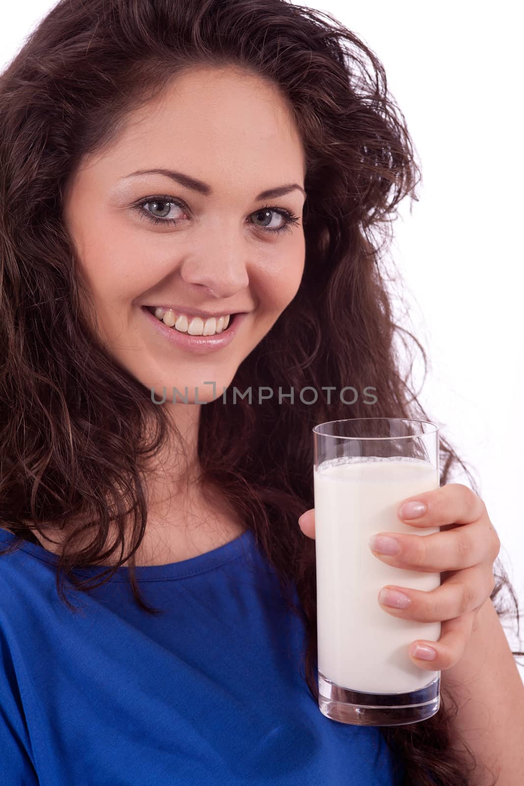 beautiful smiling woman is drinking milk isolated on white background