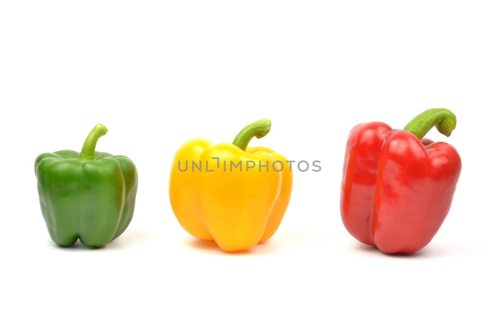 Fresh colorful paprika isolated on white background