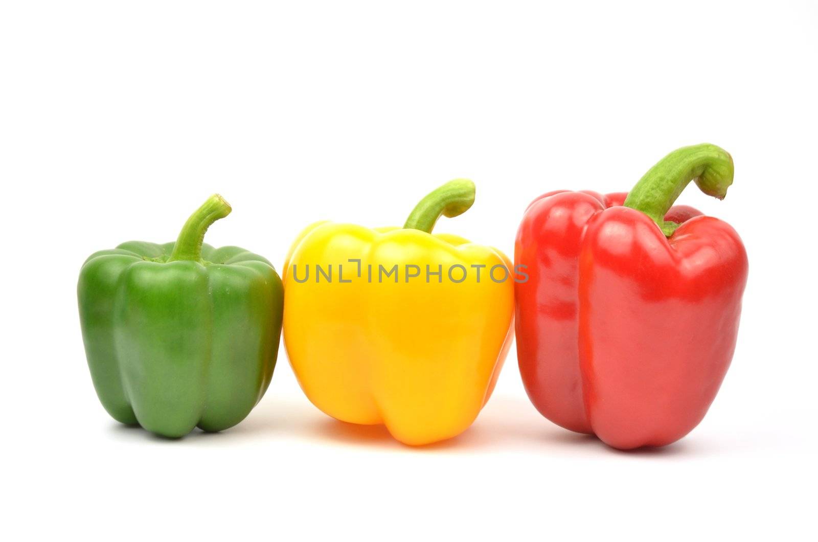 Fresh colorful paprika isolated on white background