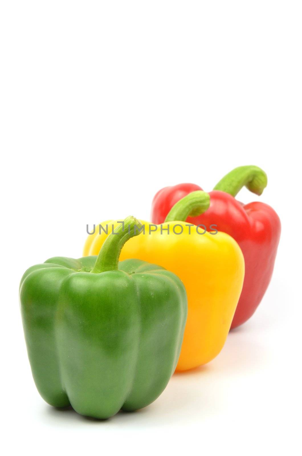 Fresh colorful paprika isolated on white background