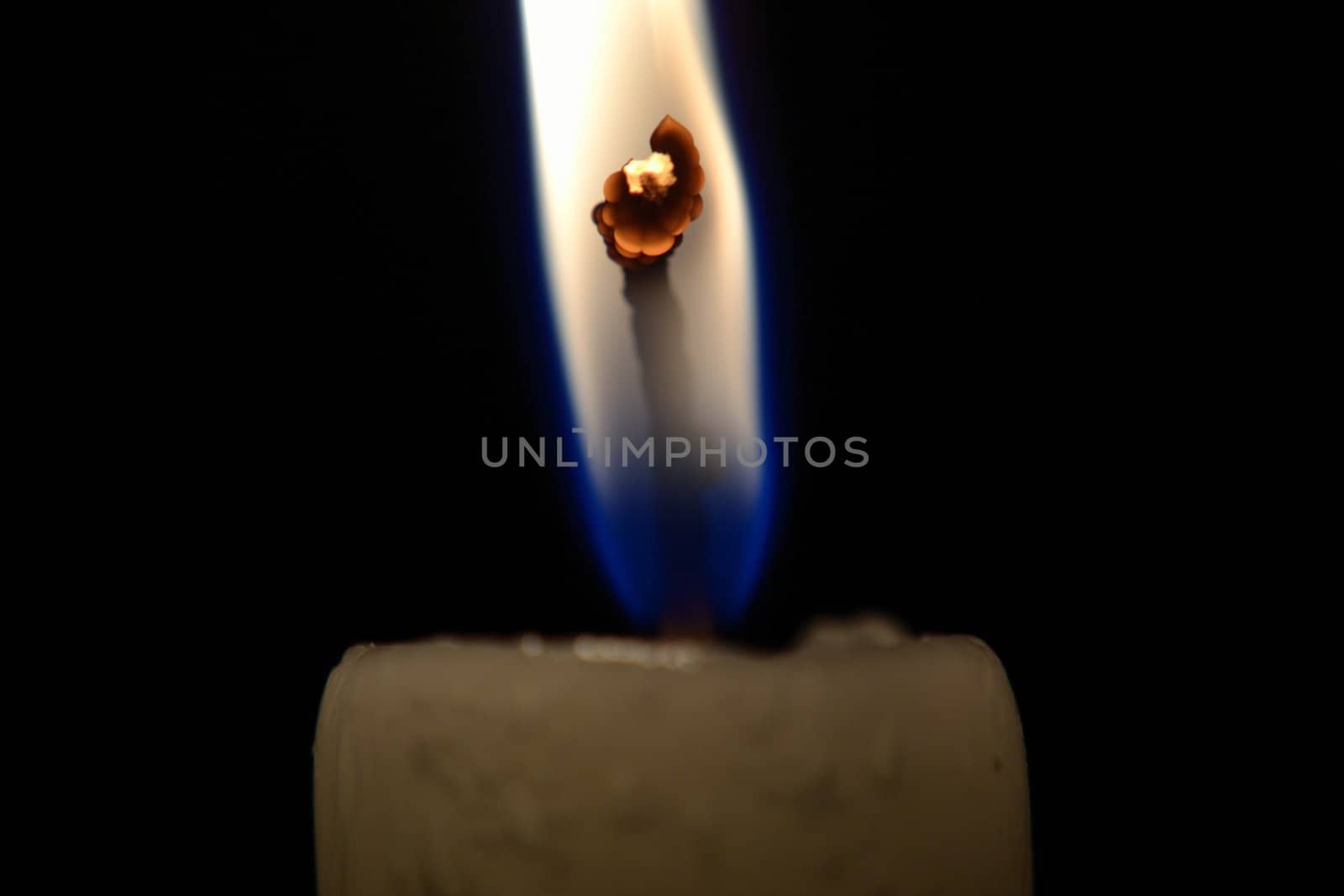 Burning candlewick by Autre