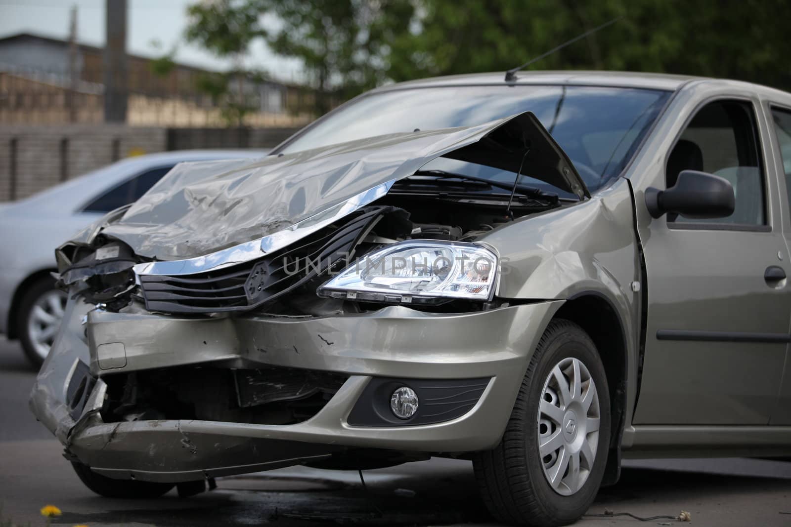 Frustrated after the collision, the car Renault Logan, front view