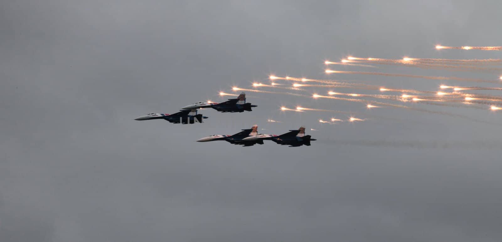 Aerobatic team 'Swifts' on the MiG-29 fighter fires a missile thermal