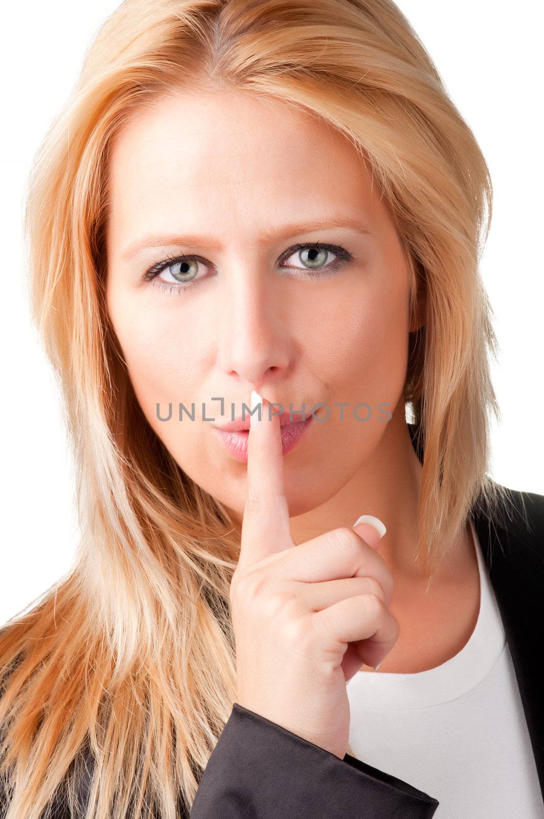 Business woman with her finger over her mouth, isolated in a white background