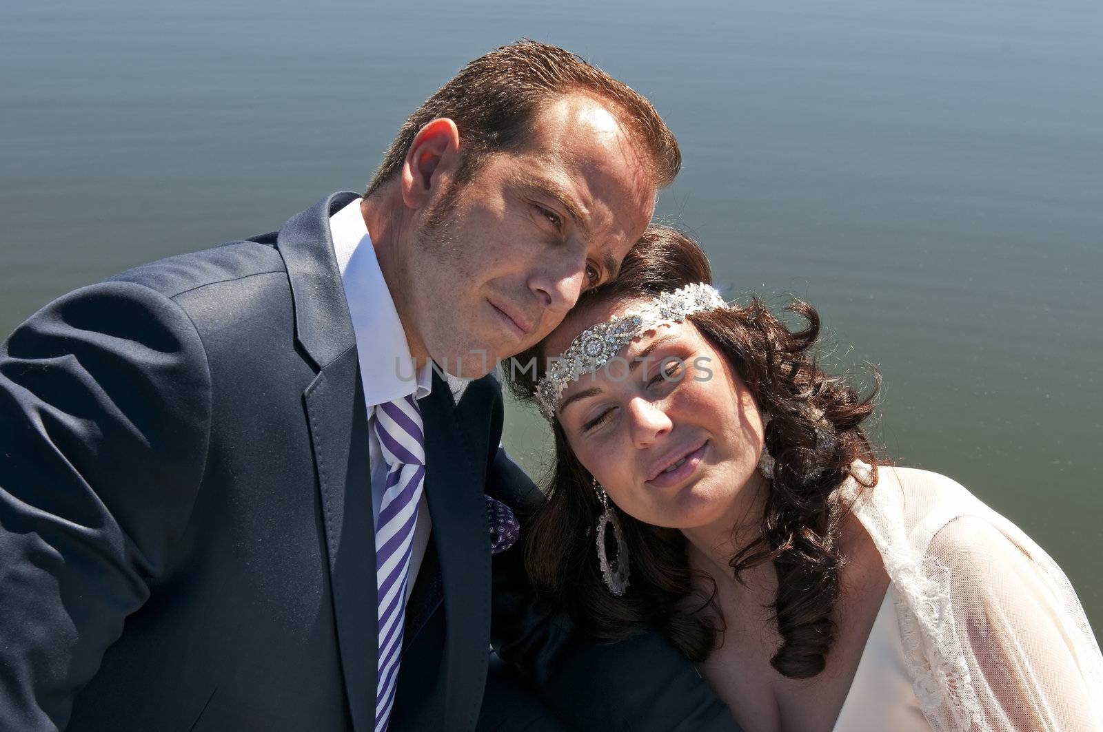 Beautiful bride and loving groom on their wedding day