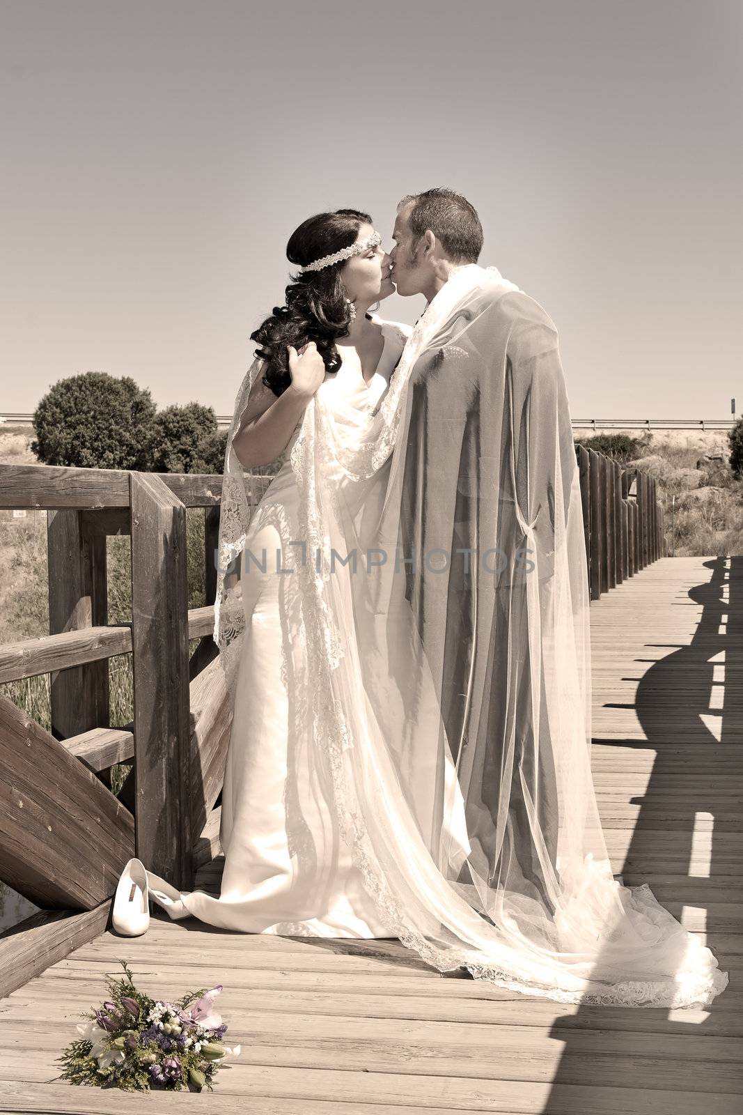 Beautiful bride and loving groom on their wedding day