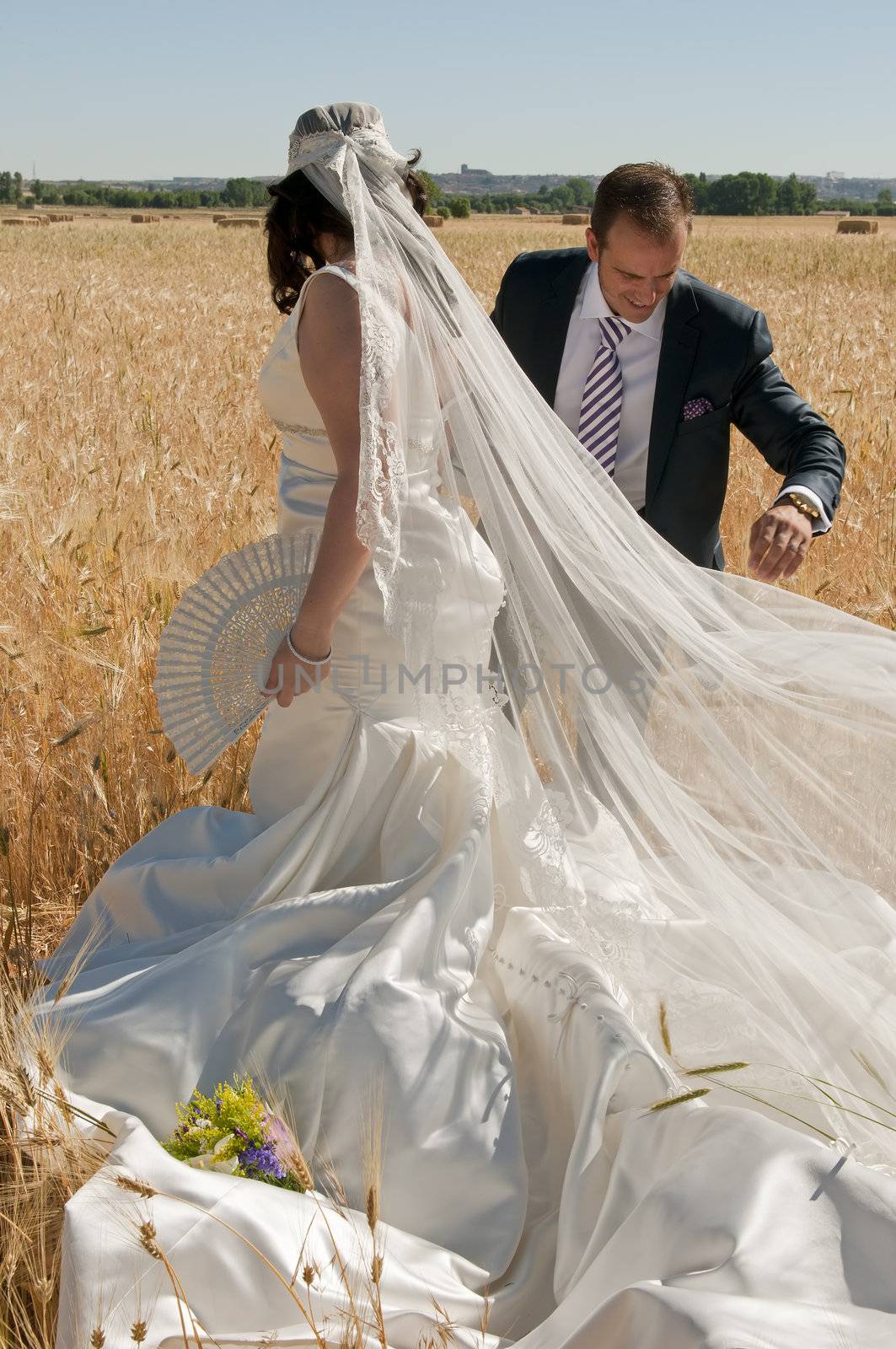 Beautiful bride and loving groom on their wedding day