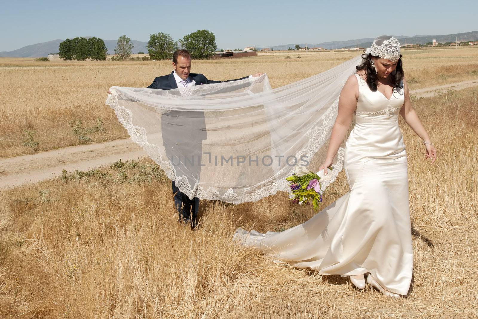 Beautiful bride and loving groom on their wedding day