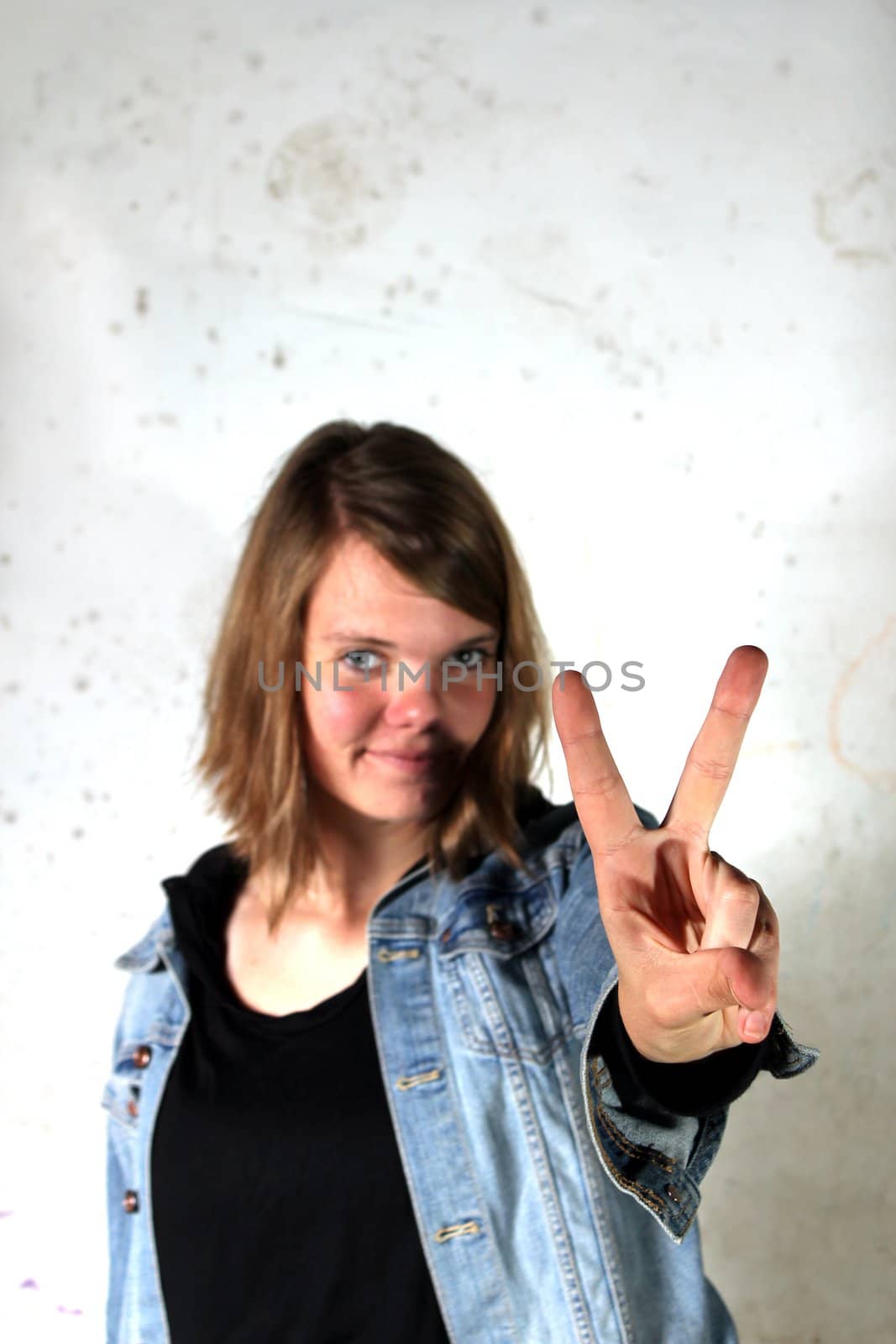 woman showing peace sign
