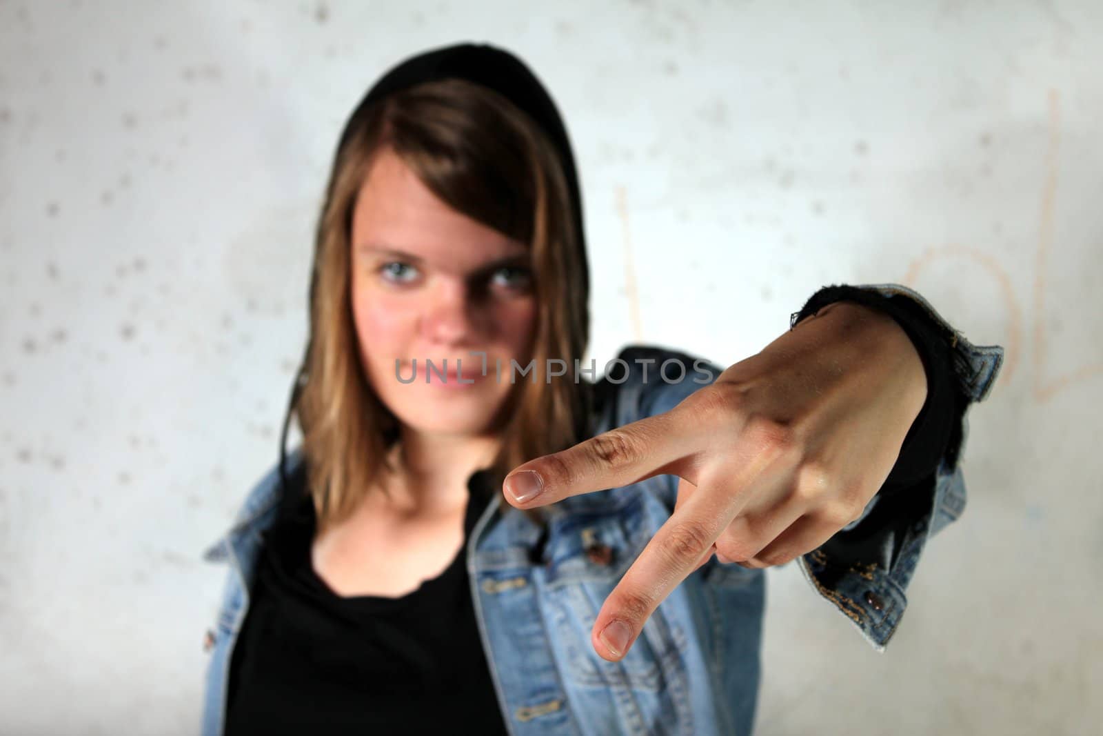 woman showing peace sign