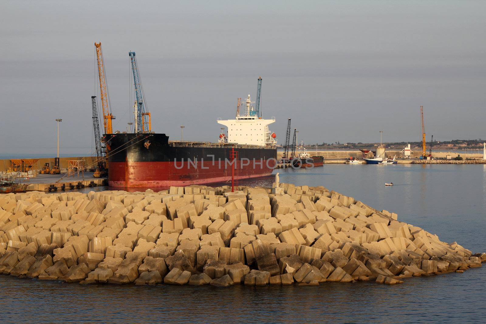 Port with focus on the breakwater in Pozzallo, Sicily 
