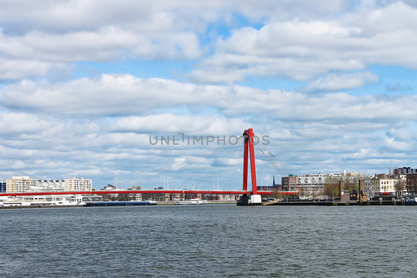  Red suspension bridge over  Maas in Rotterdam. Netherlands