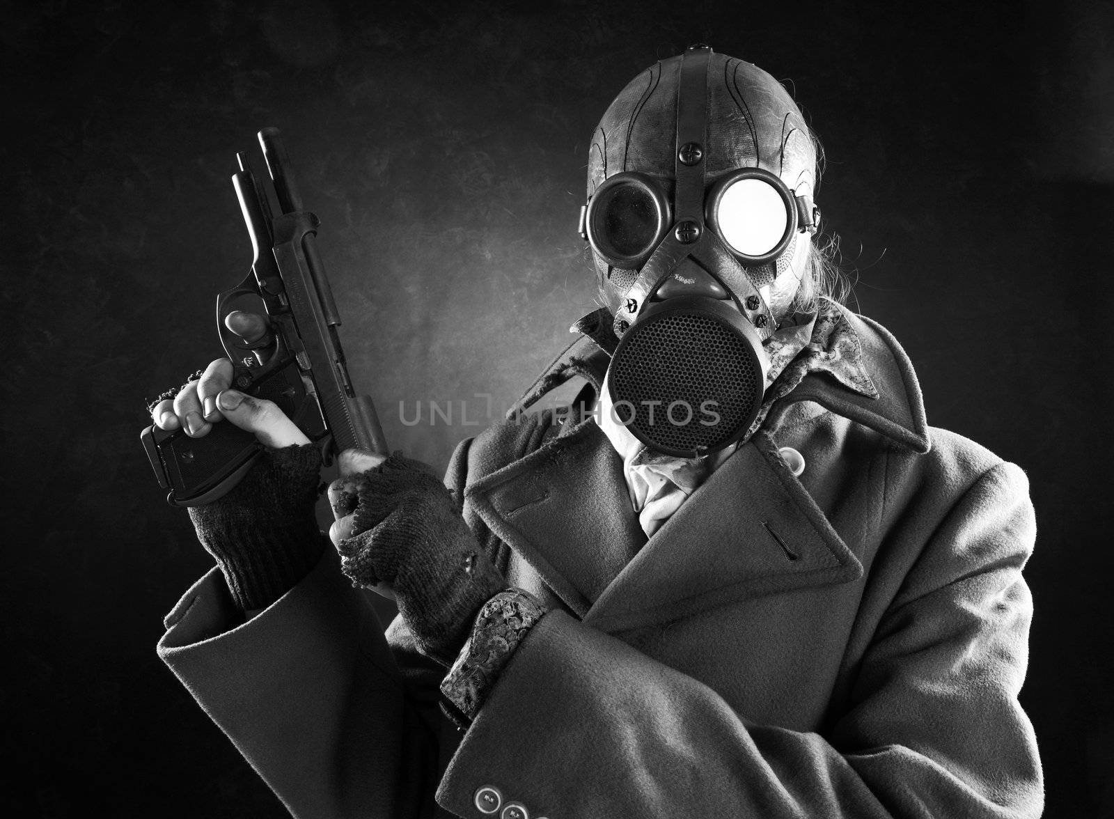 grunge portrait man in gas mask  with gun