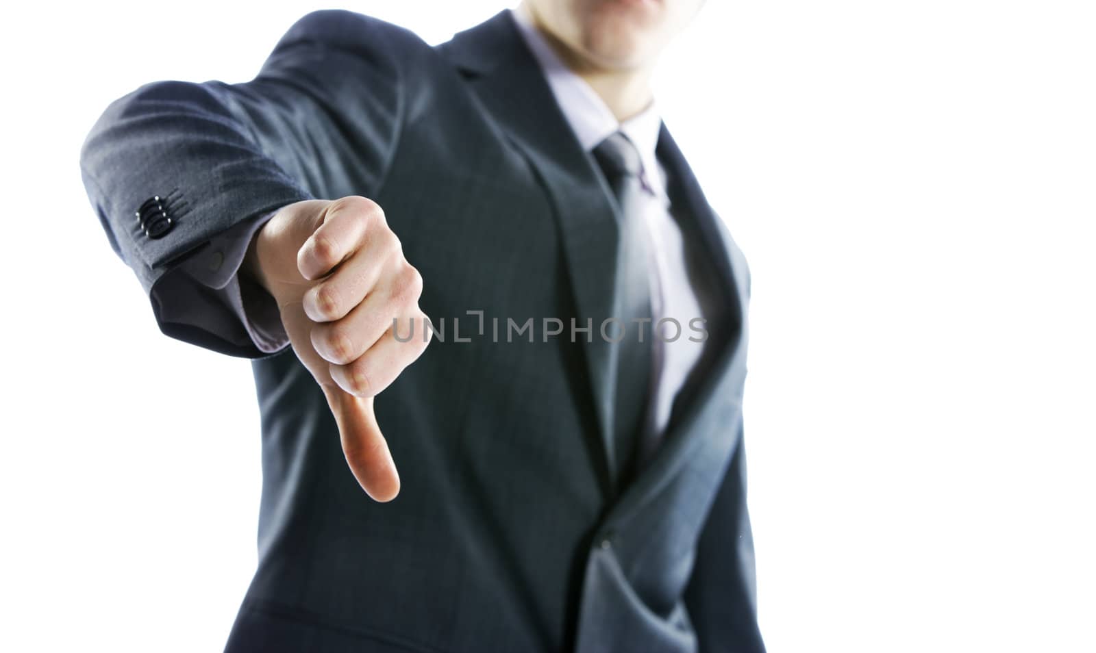 Businessman gesturing thumbs down