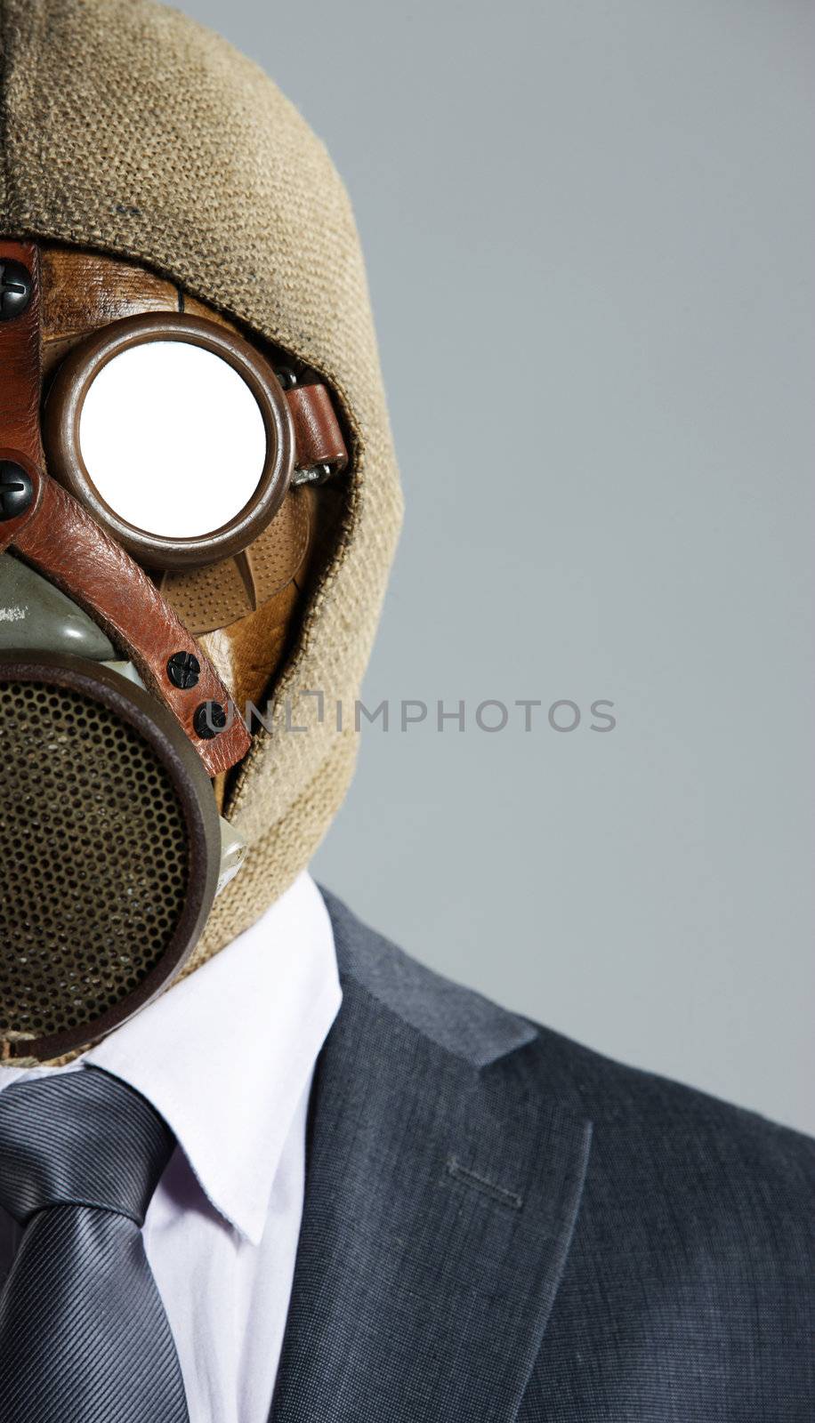portrait of businessman in a gas mask by stokkete