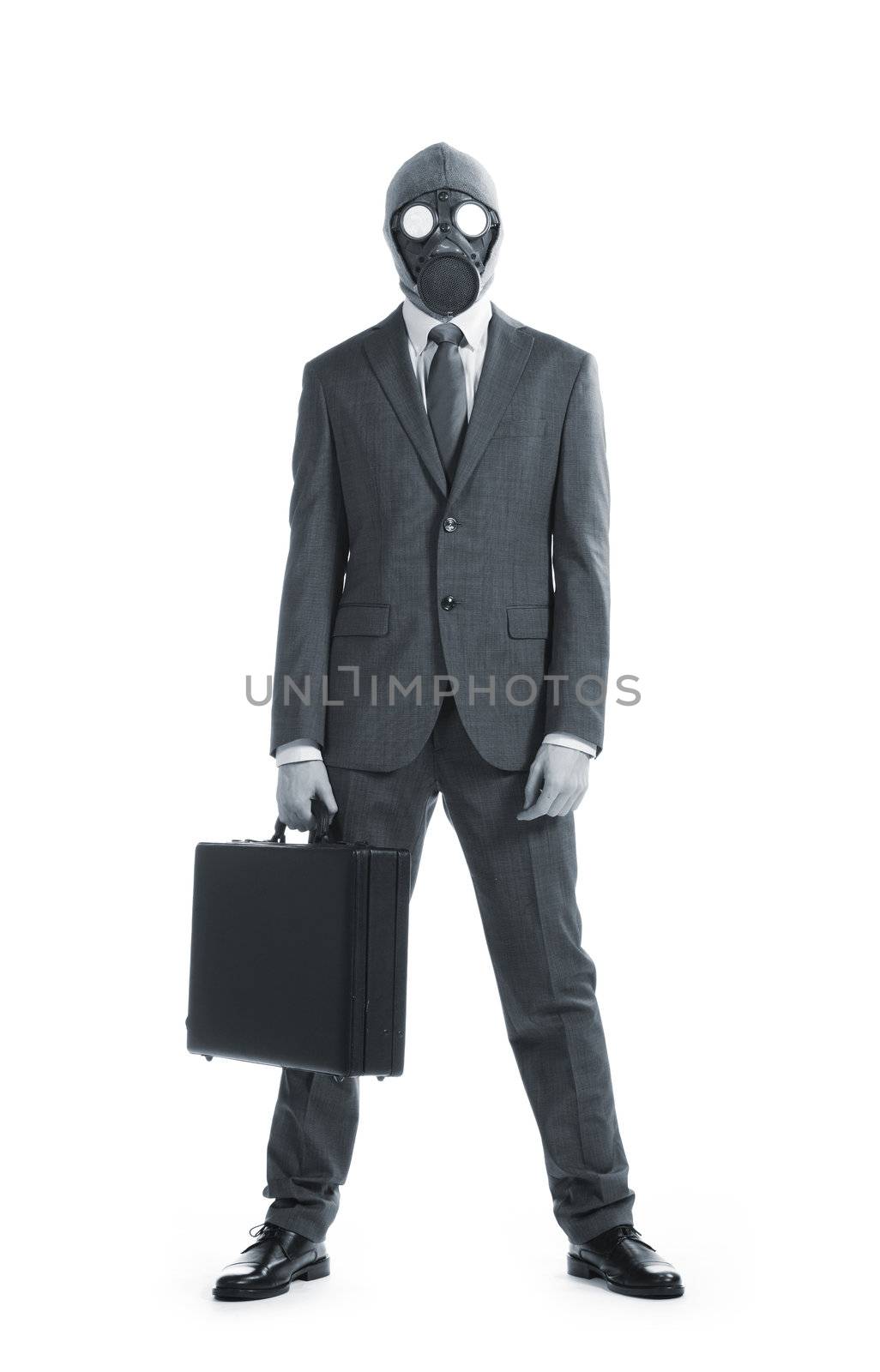 portrait of businessman in a gas mask  with suitcase